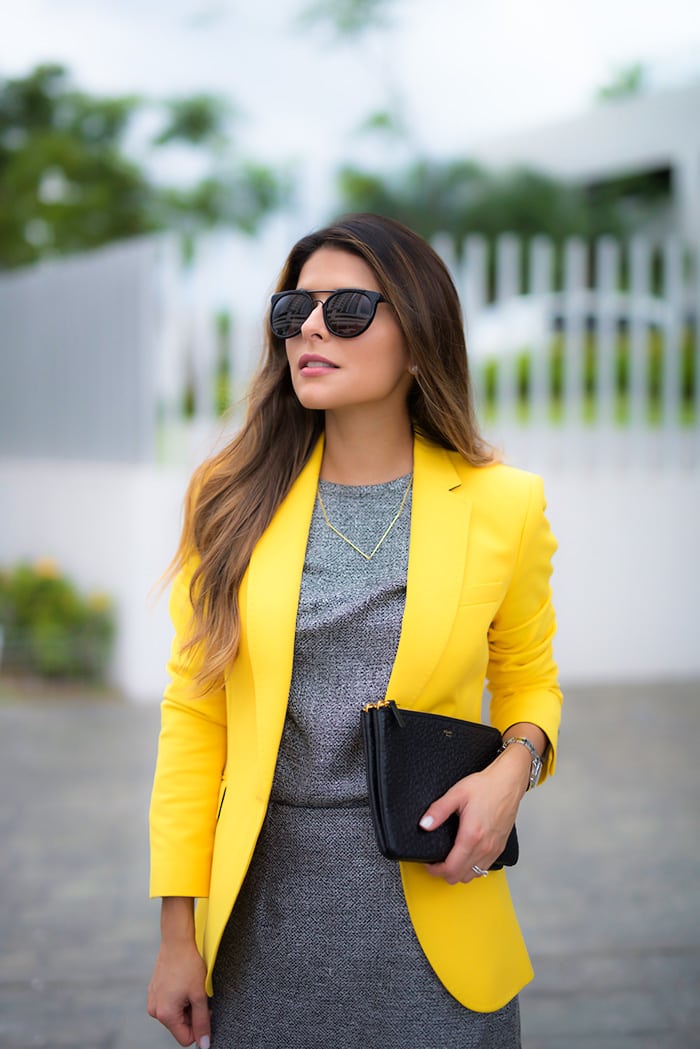 Gray matching set and a yellow blazer. Pam Hetlinger. The girl from panama.