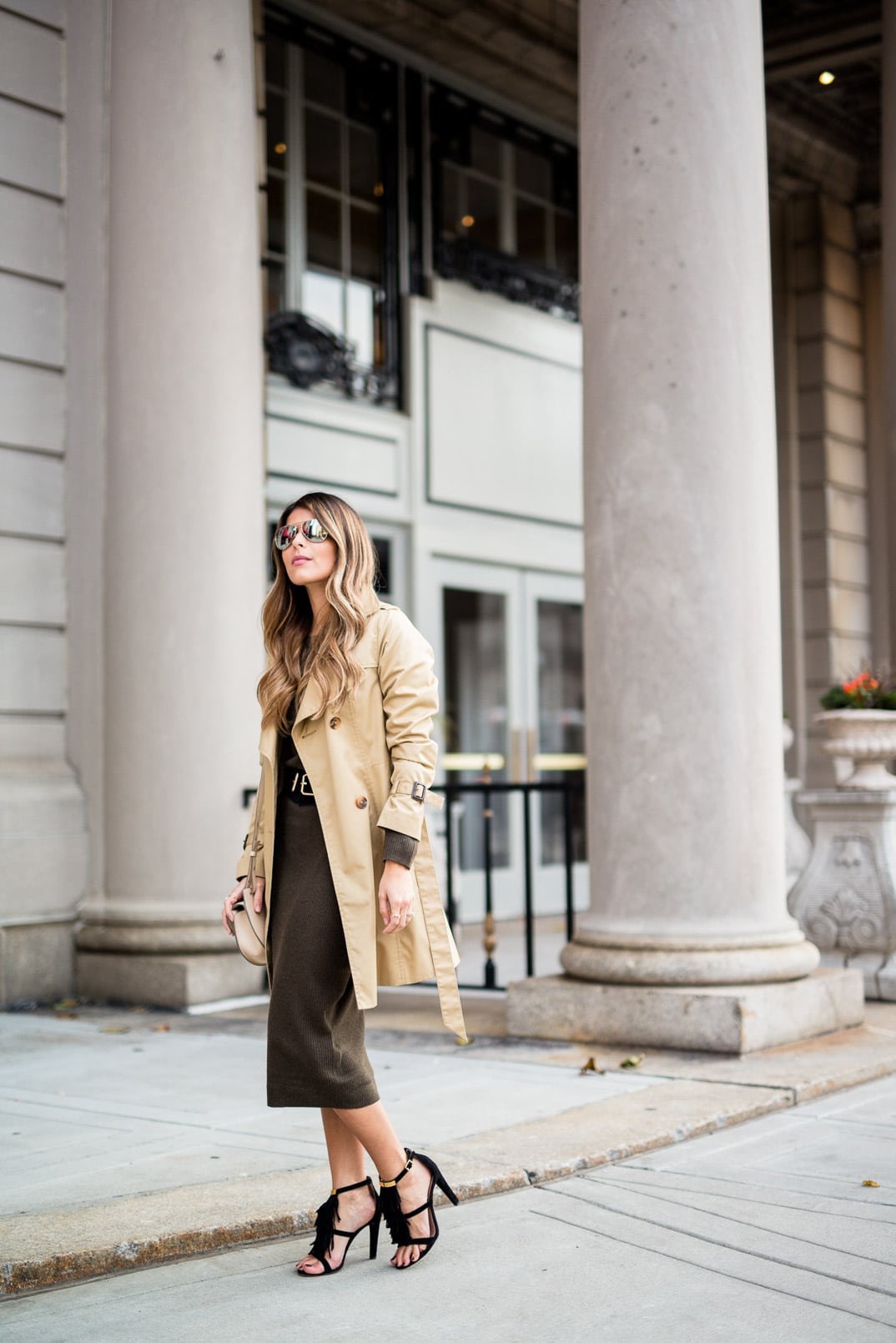 Pam Hetlinger wearing a Forever 21 knit midi dress, Chloe Georgia Bag, Chloe Fringe Sandals, Trench Coat and Mirrored Aviators