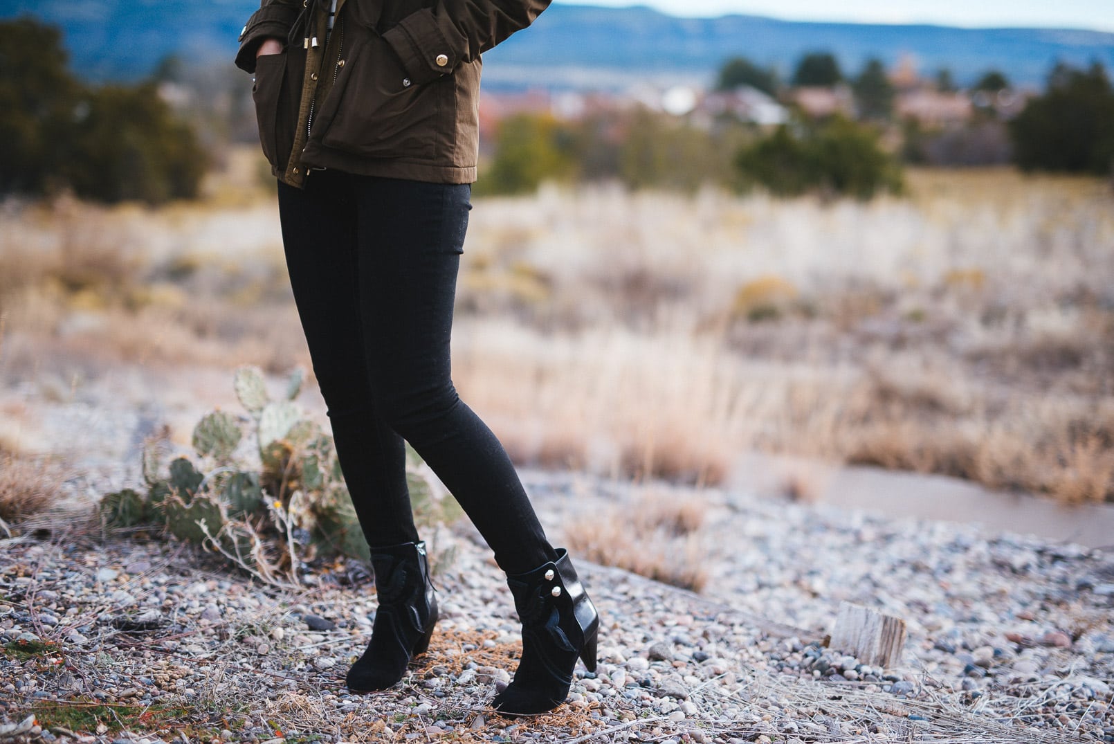 Pam Hetlinger wearing a topshop parka, h&m striped sweater, black skinny jeans and isabel marant farrah booties. Thanksgiving Outfit Idea