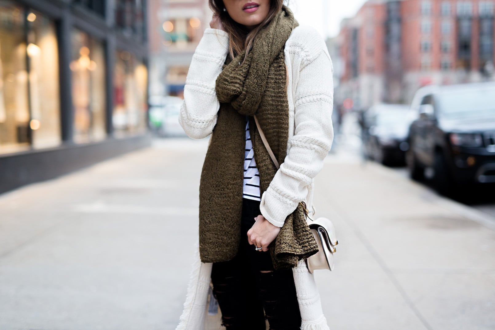 Pam Hetlinger wearing a Mango Striped Tee, Mango Black Booties, DSTLD Black Ripped Jeans, Mango Fringe Cardigan and a Forever 21 Khaki Scarf