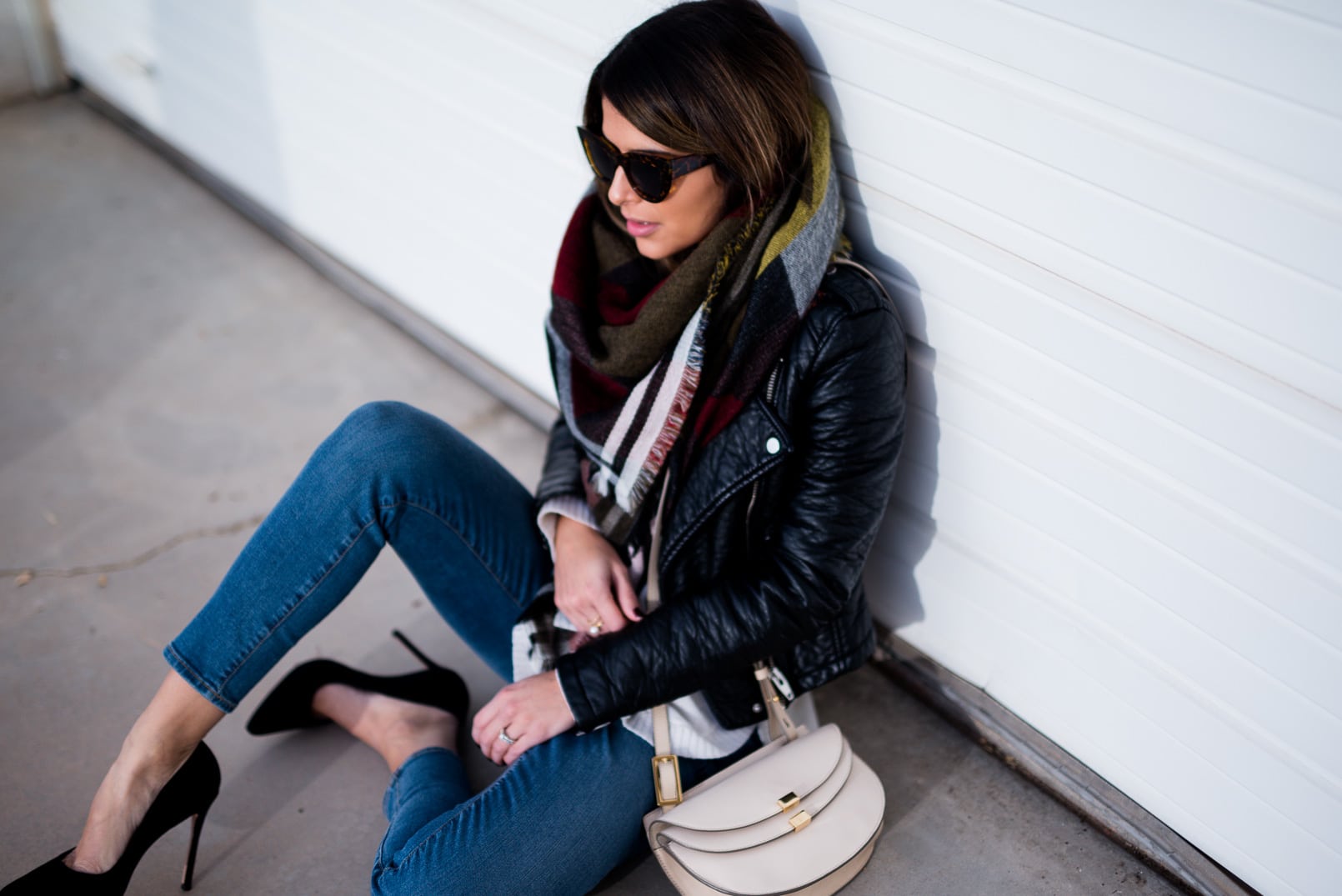 Pam Hetlinger wearing a bp plaid scarf, denim jeans, chloe georgia bag, black reiss pumps.