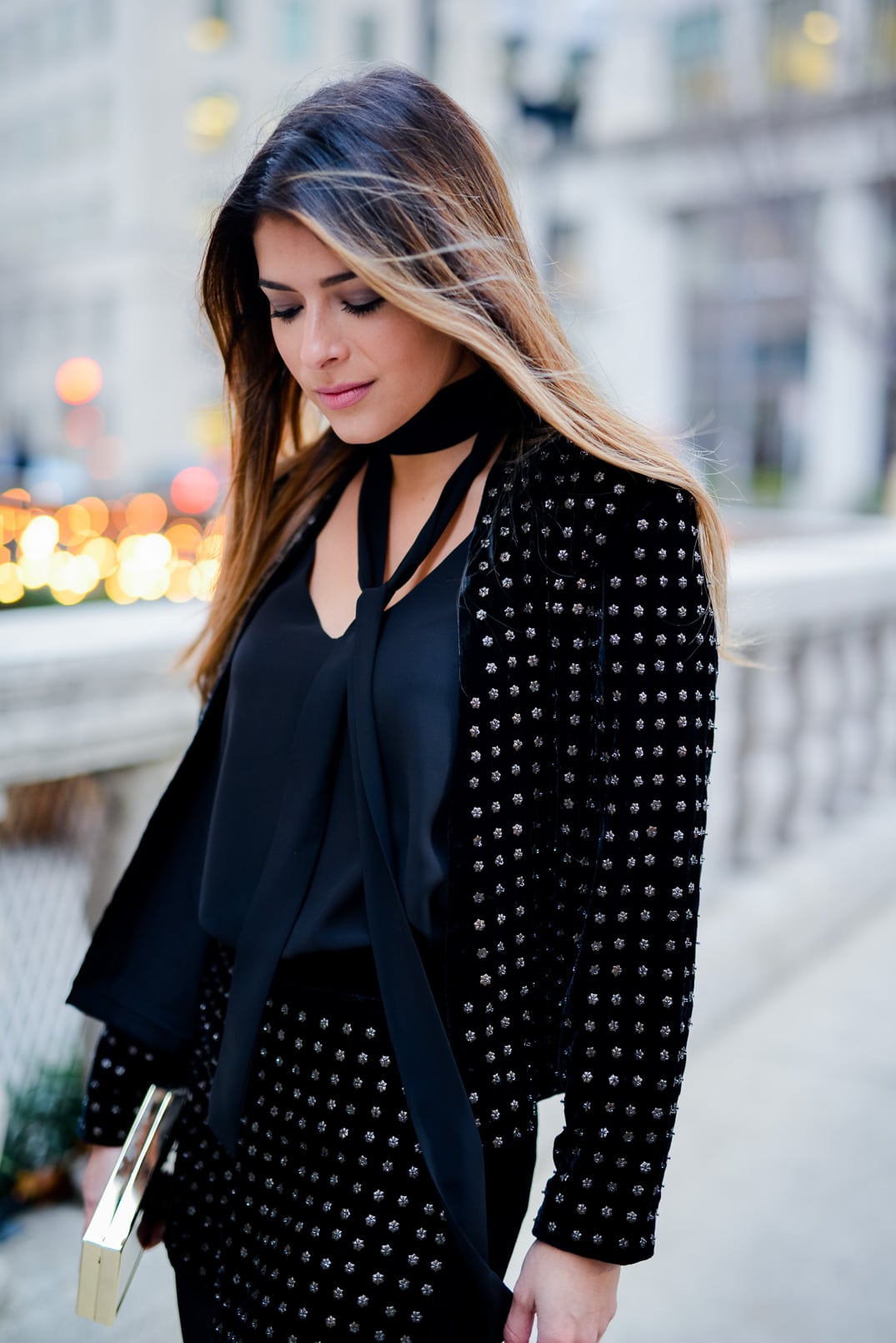 Pam Hetlinger wearing a Topshop Holiday Party Outfit, Velvet studded shorts, velvet studded blazer, skinny scarf and Delman over the knee boots