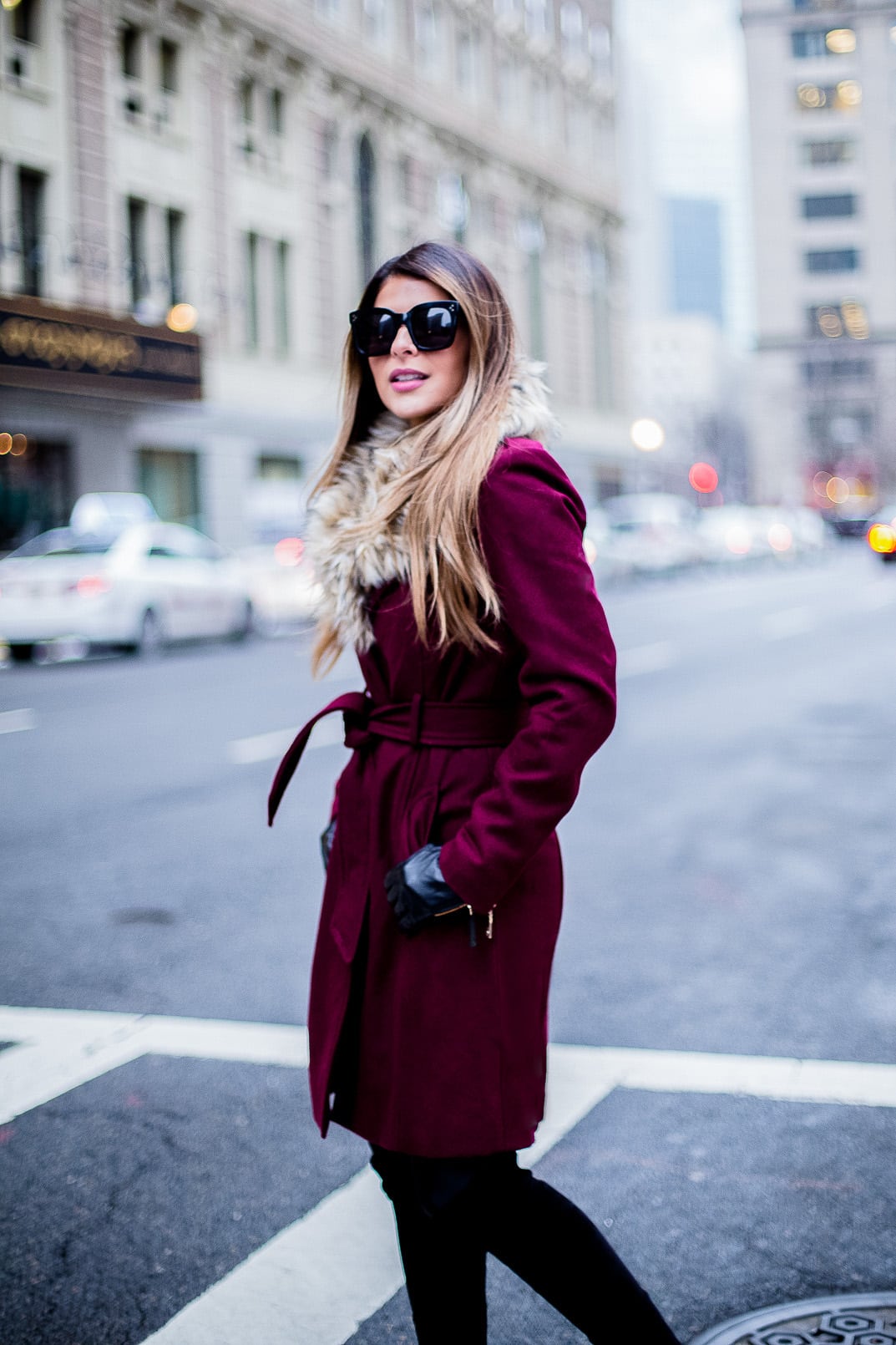Pam Hetlinger, The Girl From Panama wearing a Faux-Fur Collared Long coat, Faux-leather leggings, delman over the knee boots, and celine sunglasses.