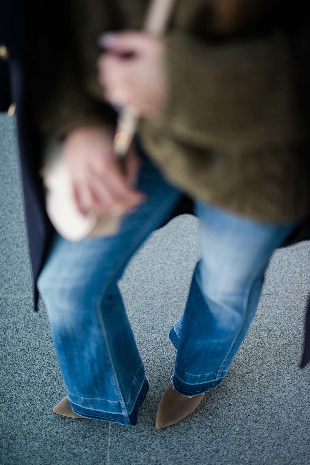 Pam Hetlinger, The Girl From Panama wearing a Khaki sweater, h&m navy coat, 7 for all mankind ginger jeans, gray booties, and chloe georgia bag.