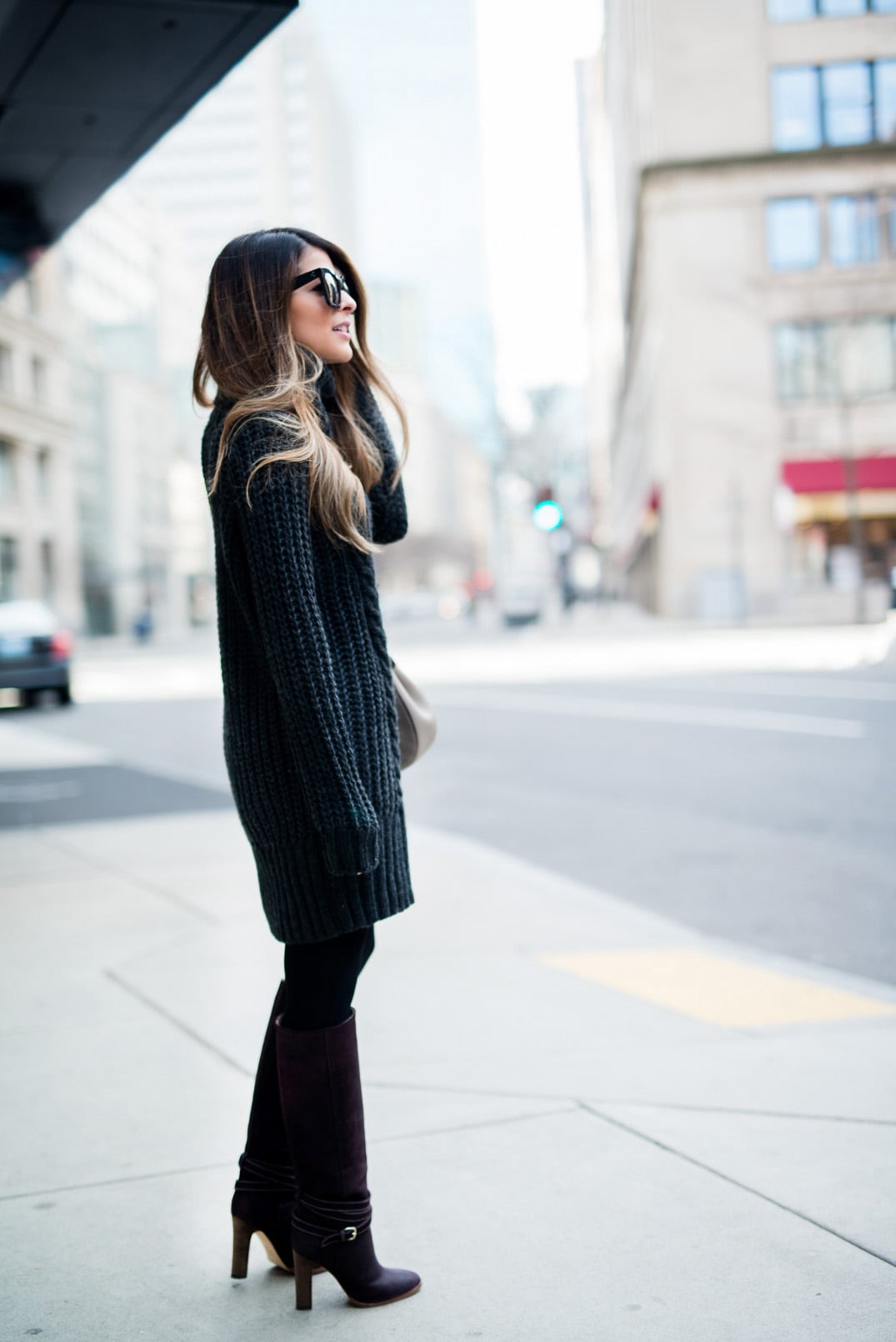 Pam Hetlinger wearing a h&m turtleneck sweater dress, club monaco buckle knee-high boot, celine sunglasses, grey chloe drew bag, and black tights