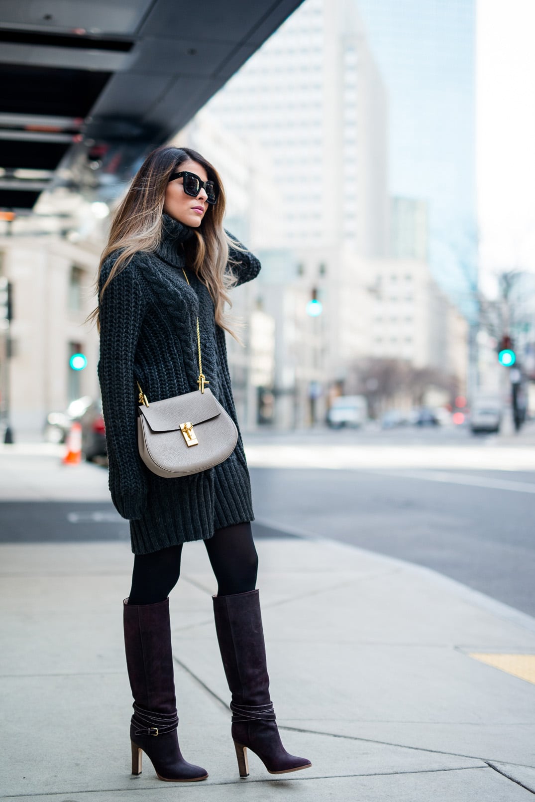 sweater dress and high boots