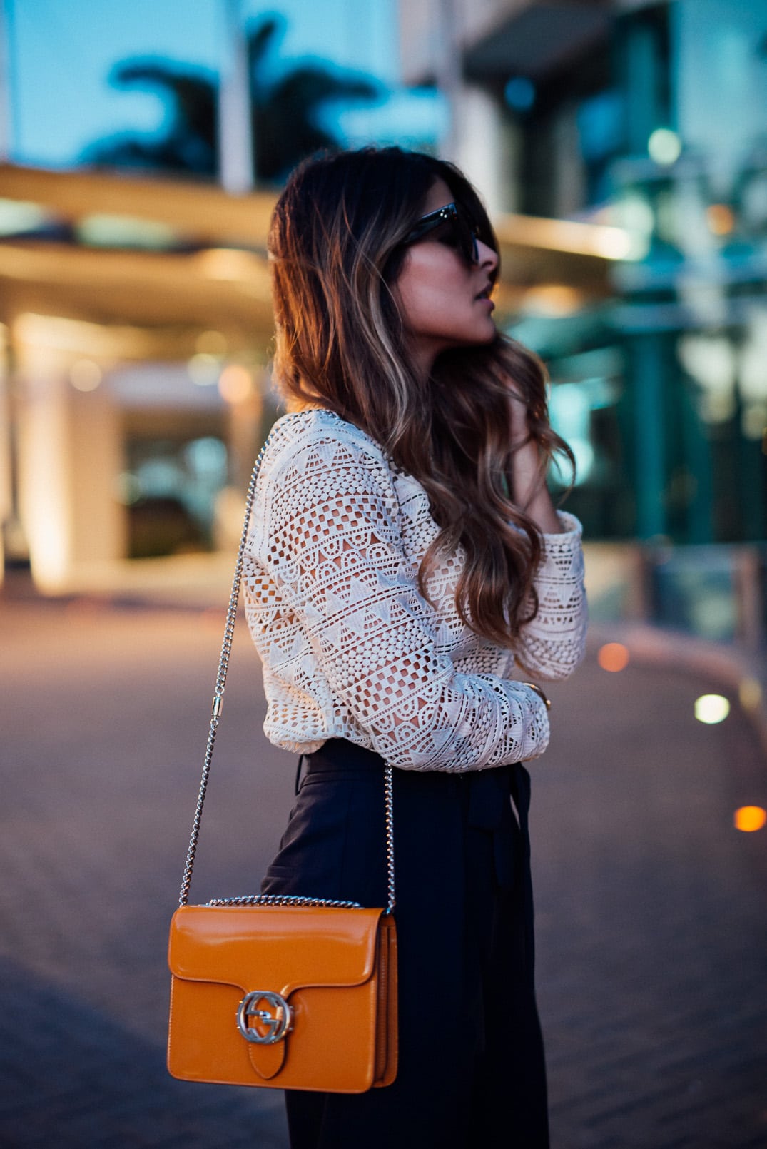 Pam Hetlinger, The Girl From Panama wearing a mango crochet top, high waist topshop navy pants, ankle strap sandals and a gucci interlocking bag