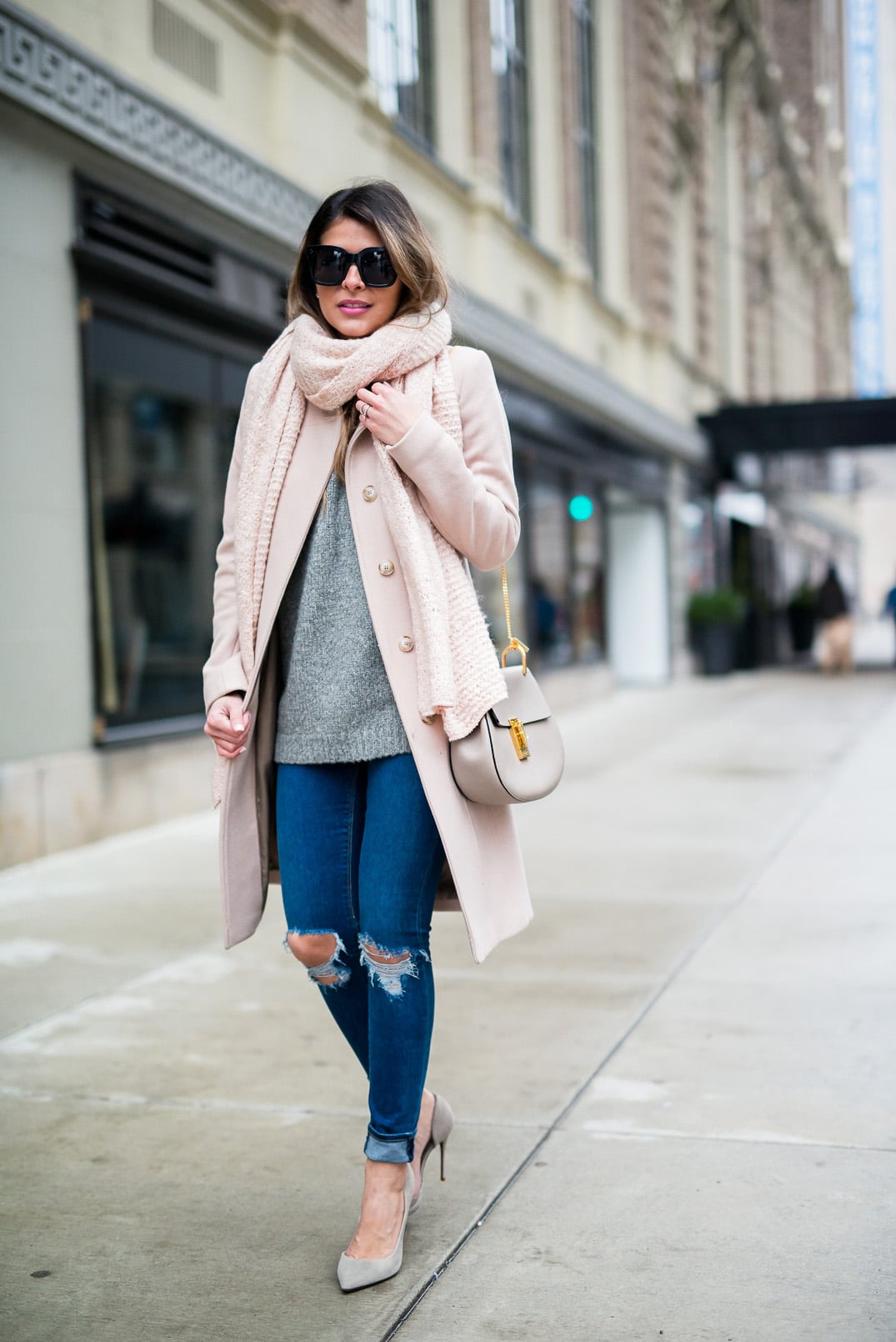 Pam Hetlinger, The Girl From Panama wearing rose quartz color of the year, funnel neck pink coat, asos ripped jeans, schutz grey pumps, celine sunglasses, forever 21 pink scarf, and a chloe drew bag in grey.