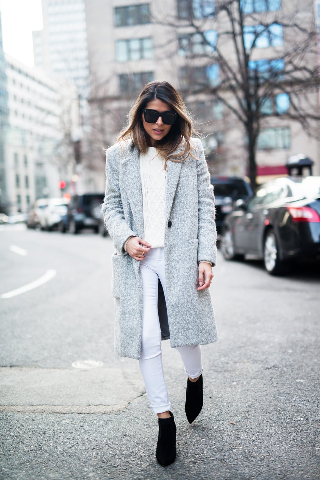 Pam Hetlinger, The Girl From Panama, wearing a Zac Posen Gray Coat, White Jeans, White Sweater, Black booties, Celine Sunglasses. The easiest way to style a gray coat.