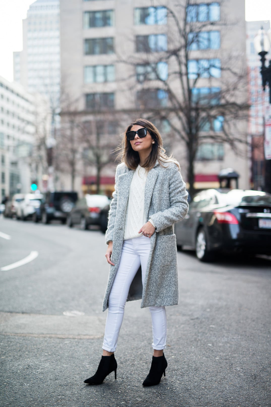 Pam Hetlinger, The Girl From Panama, wearing a Zac Posen Gray Coat, White Jeans, White Sweater, Black booties, Celine Sunglasses. The easiest way to style a gray coat.