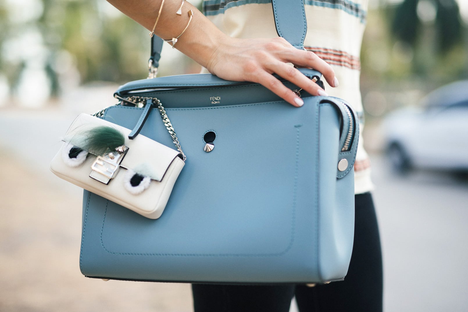 Pam Hetlinger, The Girl From Panama wearing an H&M Halter top, Mango Flare Jeans, Fendi DotCom bag, M.A.C Cosmetics velvetease lip pencil, and Fendi micro bag.