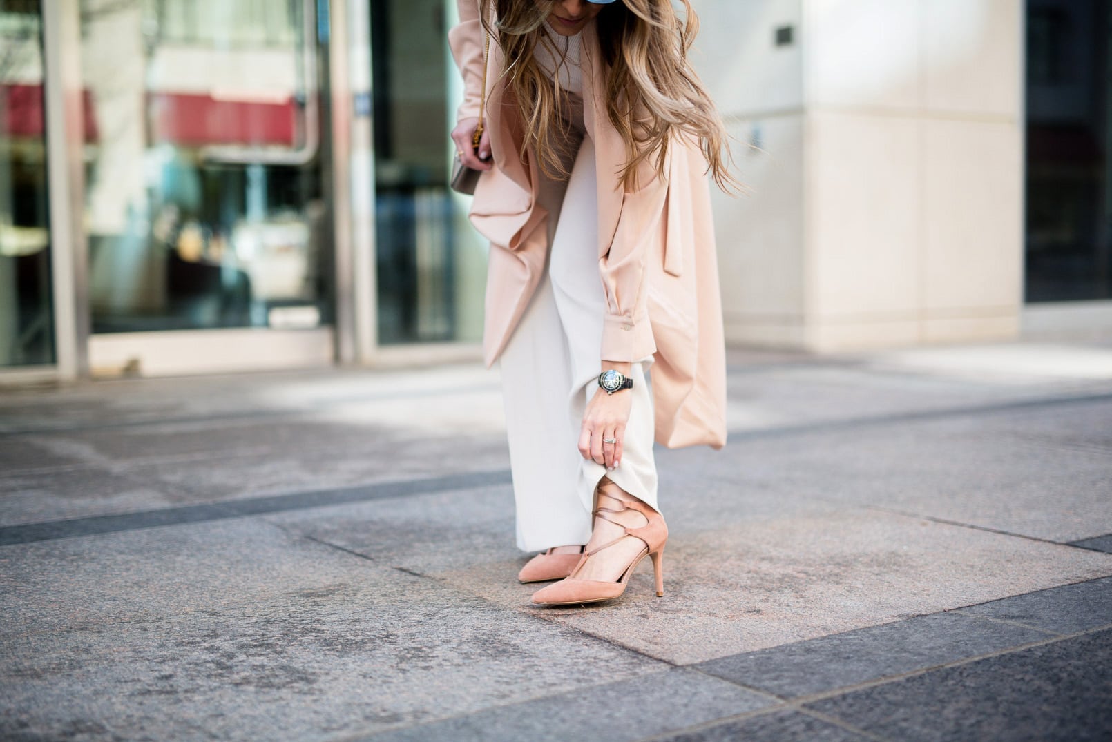 Pam Hetlinger wearing a Mango blush jacket, reiss lace up pumps, h&m high waisted white pants, h&m white crop top sweater, dior sunglasses, and chloe drew bag.