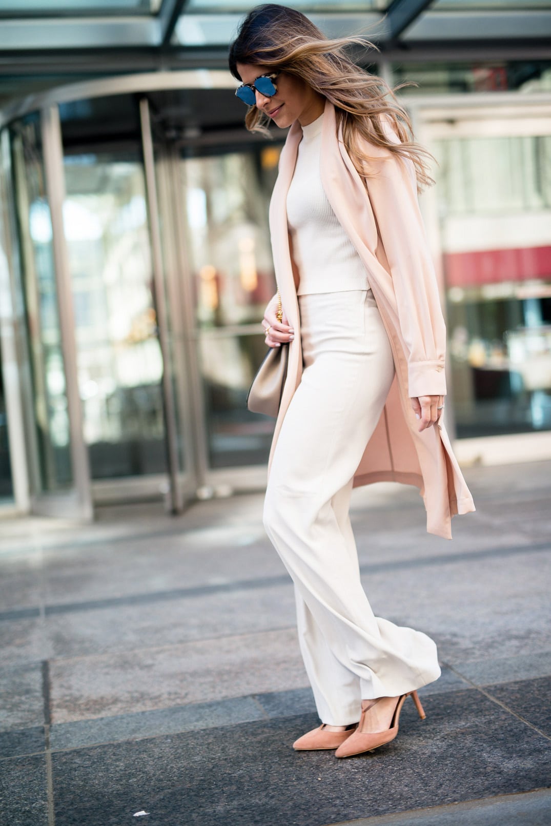 Pam Hetlinger wearing a Mango blush jacket, reiss lace up pumps, h&m high waisted white pants, h&m white crop top sweater, dior sunglasses, and chloe drew bag.