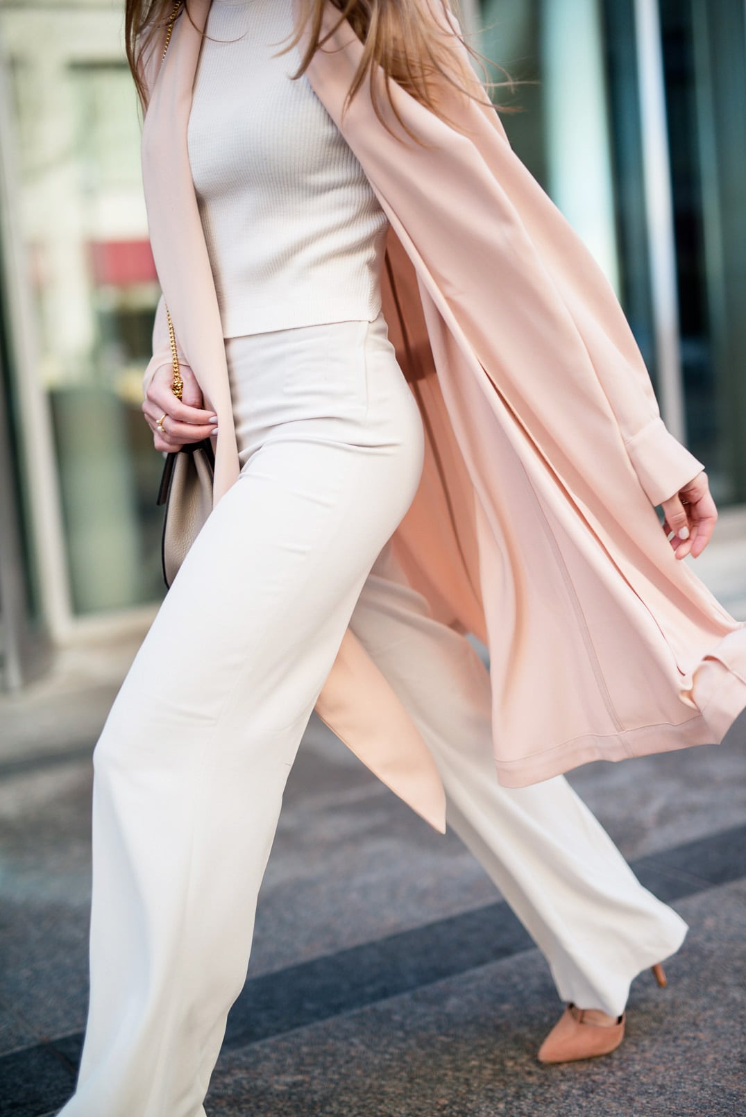 Pam Hetlinger wearing a Mango blush jacket, reiss lace up pumps, h&m high waisted white pants, h&m white crop top sweater, dior sunglasses, and chloe drew bag.