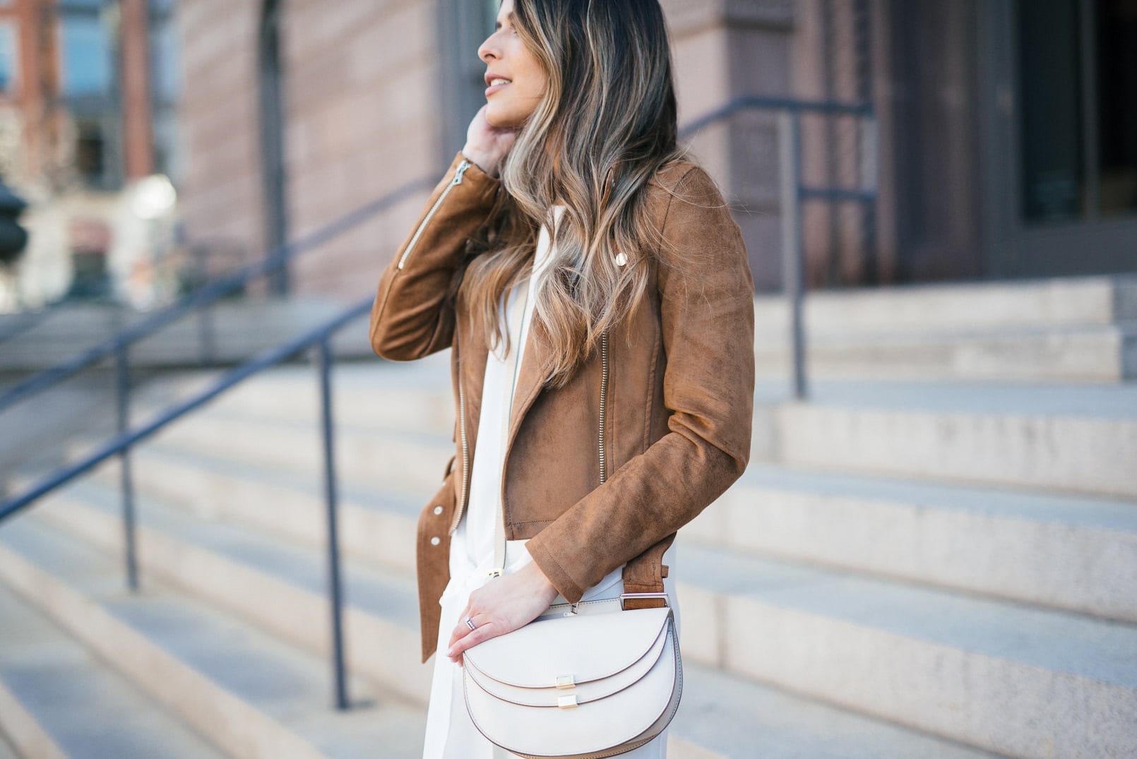 Pam Hetlinger, The Girl From Panama wearing a J.O.A tie front dress, marc fisher fawn gladiator sandals, aritzia camel suede jacket, and chloe georgia bag.