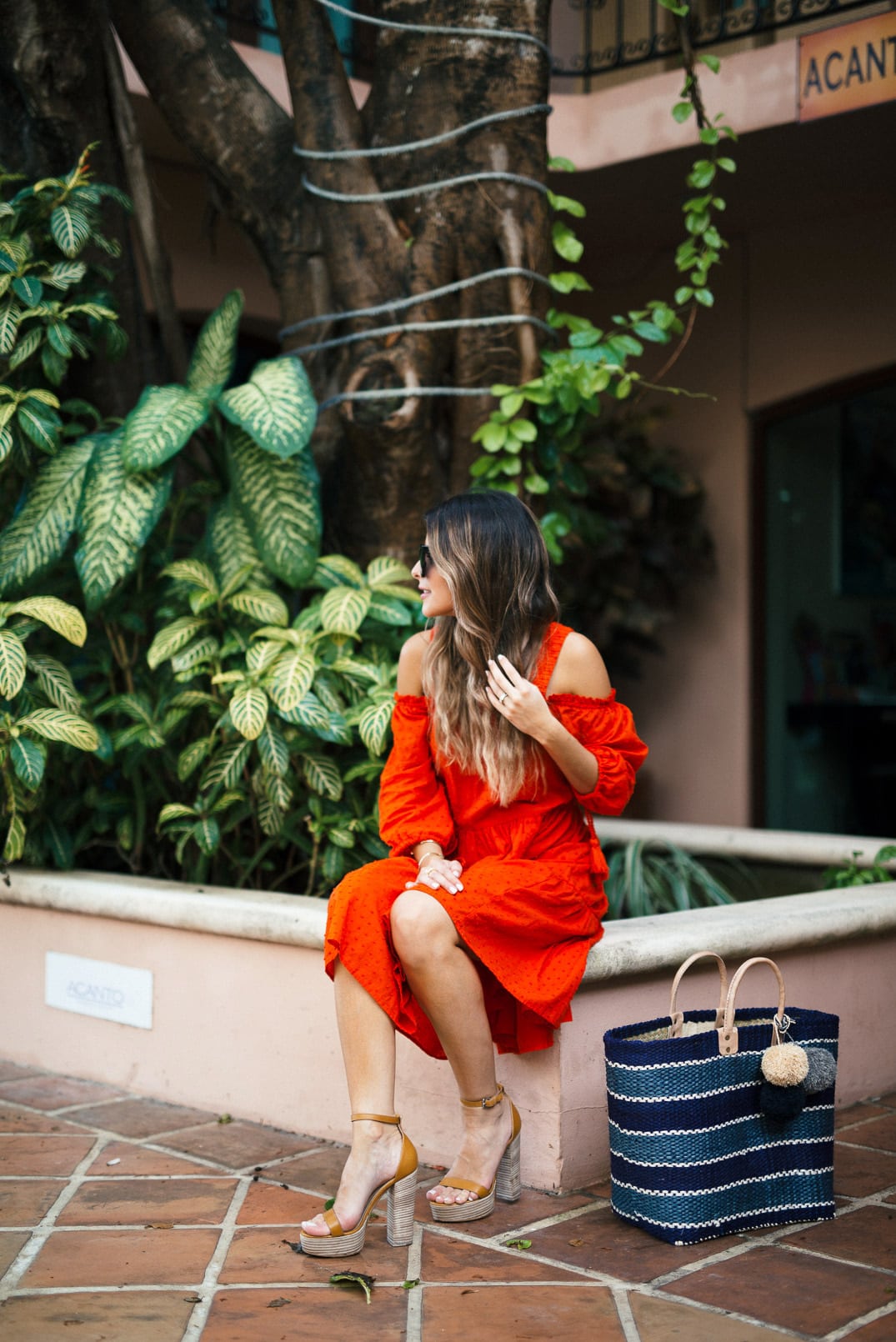 Pam Hetlinger wearing a m.gemi albero sandals, h&m red dress, celine sunglasses, and a mar y sol capri tote.