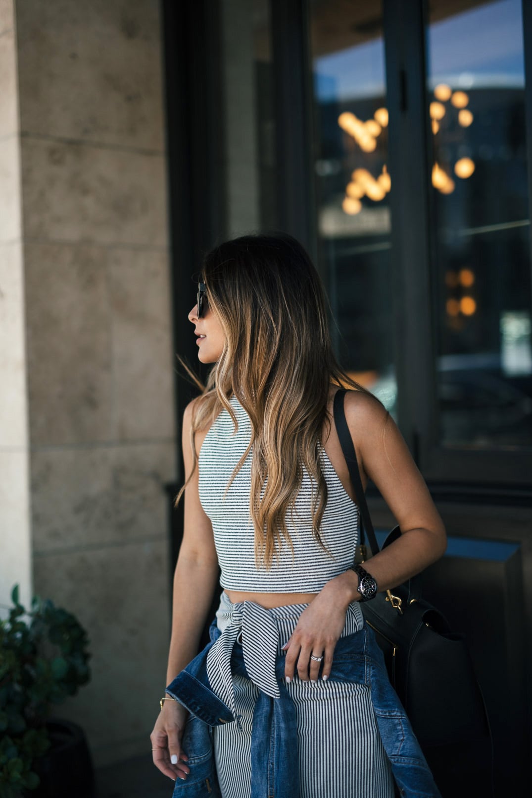 How to look chic in white sneakers | The Girl From Panama - Isabel Marant Sneakers, Club Monaco Halter top, Club Monaco knit skirt, Celine belt bag