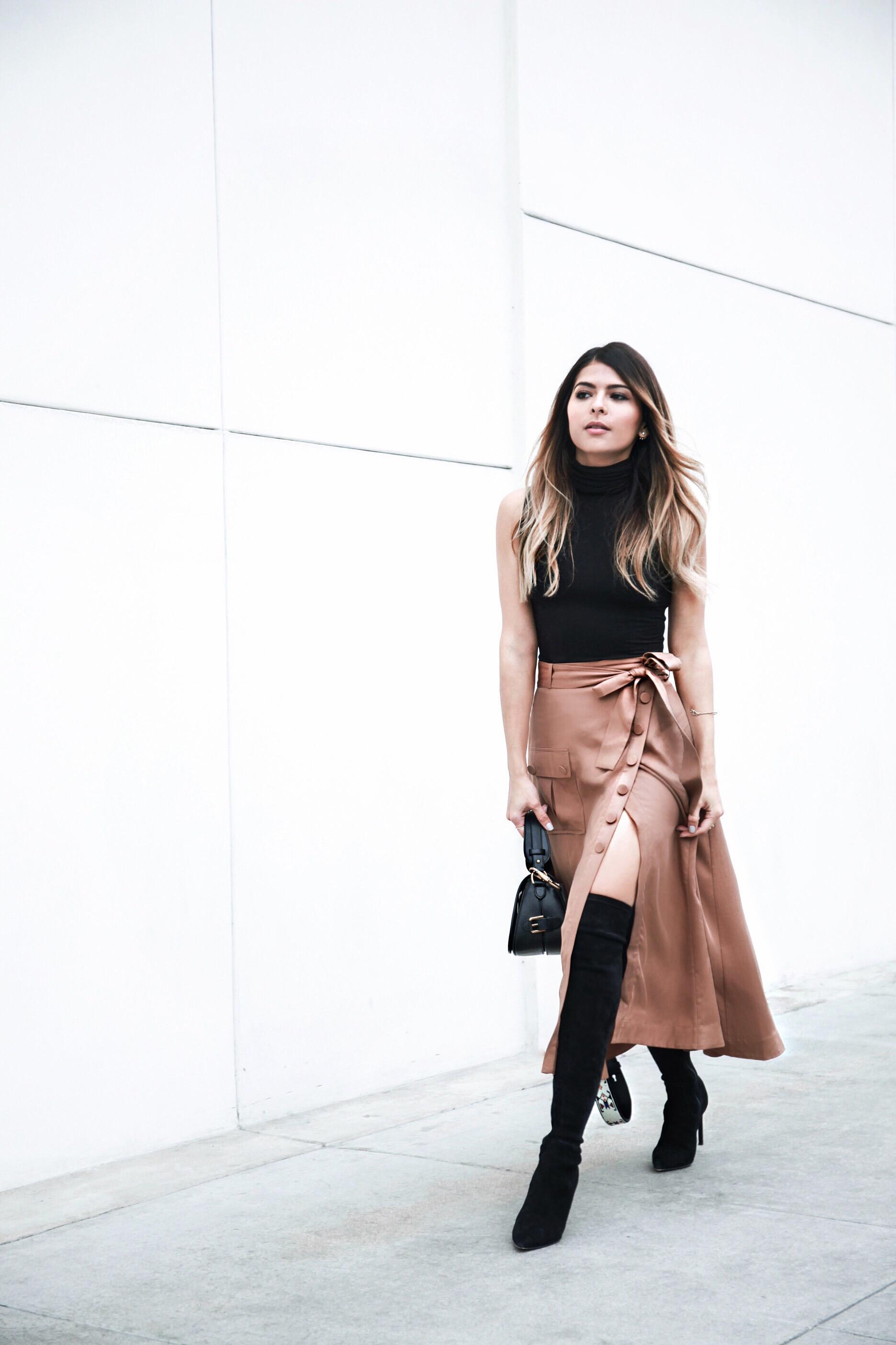 Over-the-knee boots, high slit skirt, sleeveless turtleneck, Pam Hetlinger, The Girl From Panama