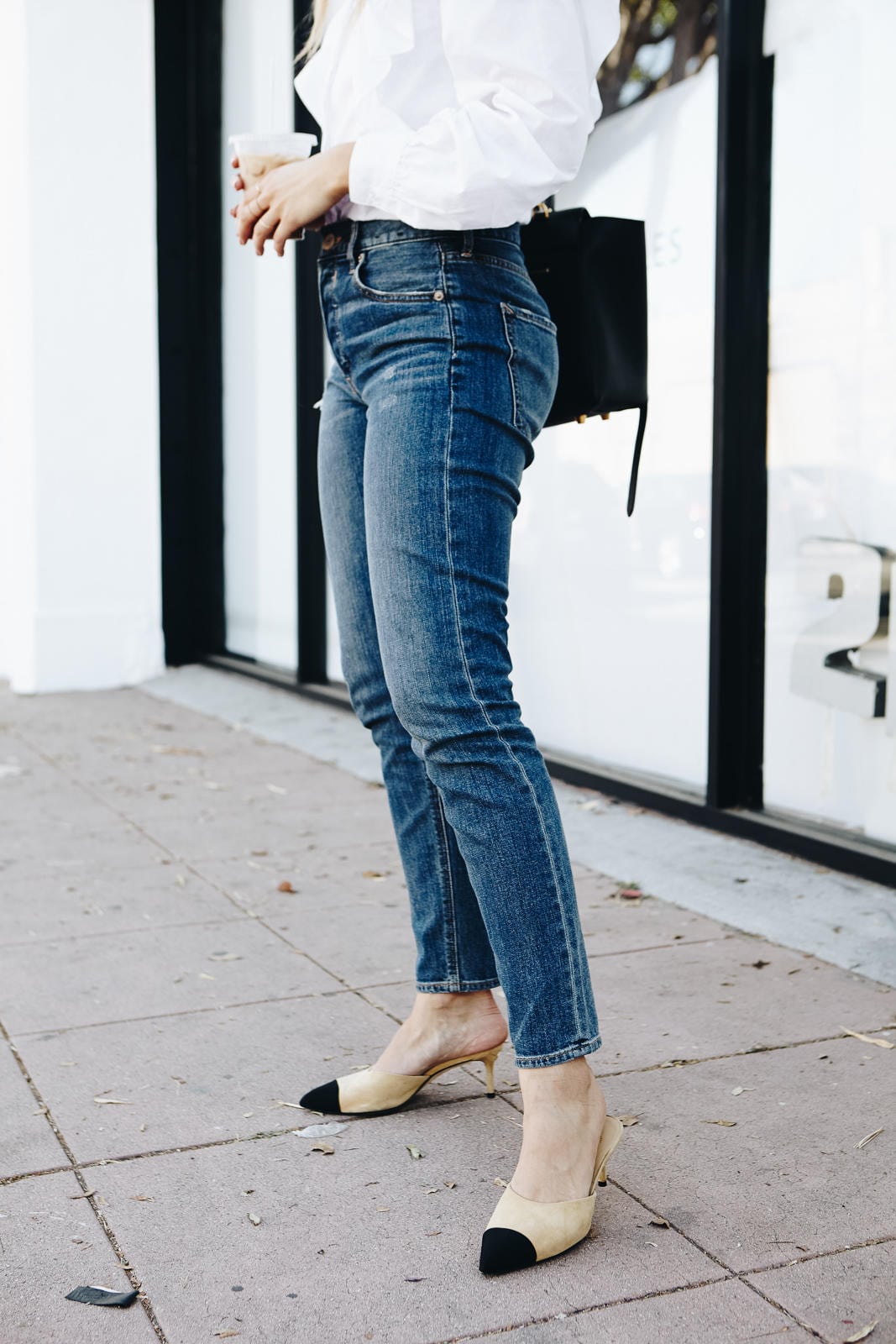 Express Ruffle front long sleeve top, high waisted skinny jeans, chanel mules |The Girl From Panama