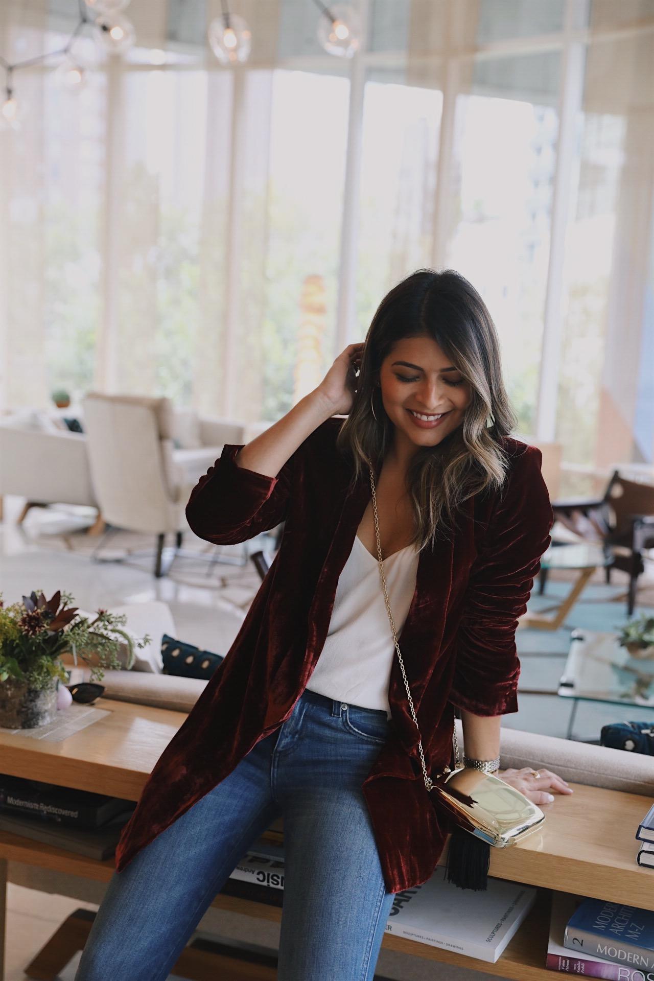 Pam Hetlinger from The Girl From Panama wearing a velvet blazer and amo jeans at the James Hotel Soho.