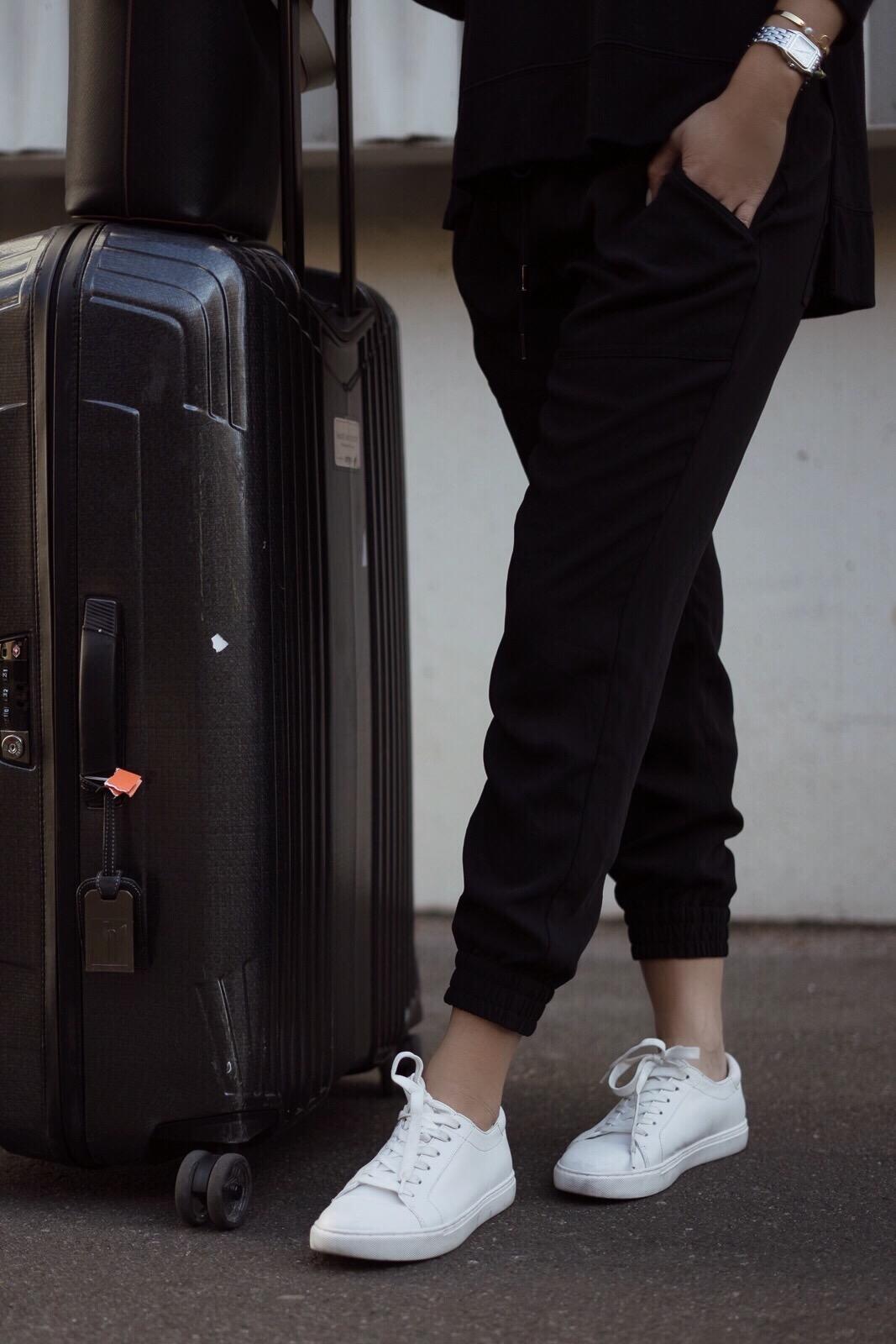 Pam Hetlinger shows the perfect travel attire outfit and white sneakers 