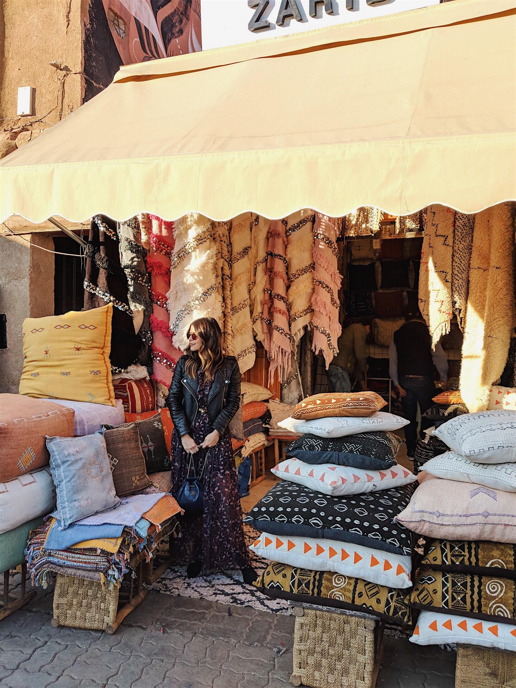 Pam Hetlinger wearing a Tara Jarmon dress at the Souk in Marrakech, Morocco