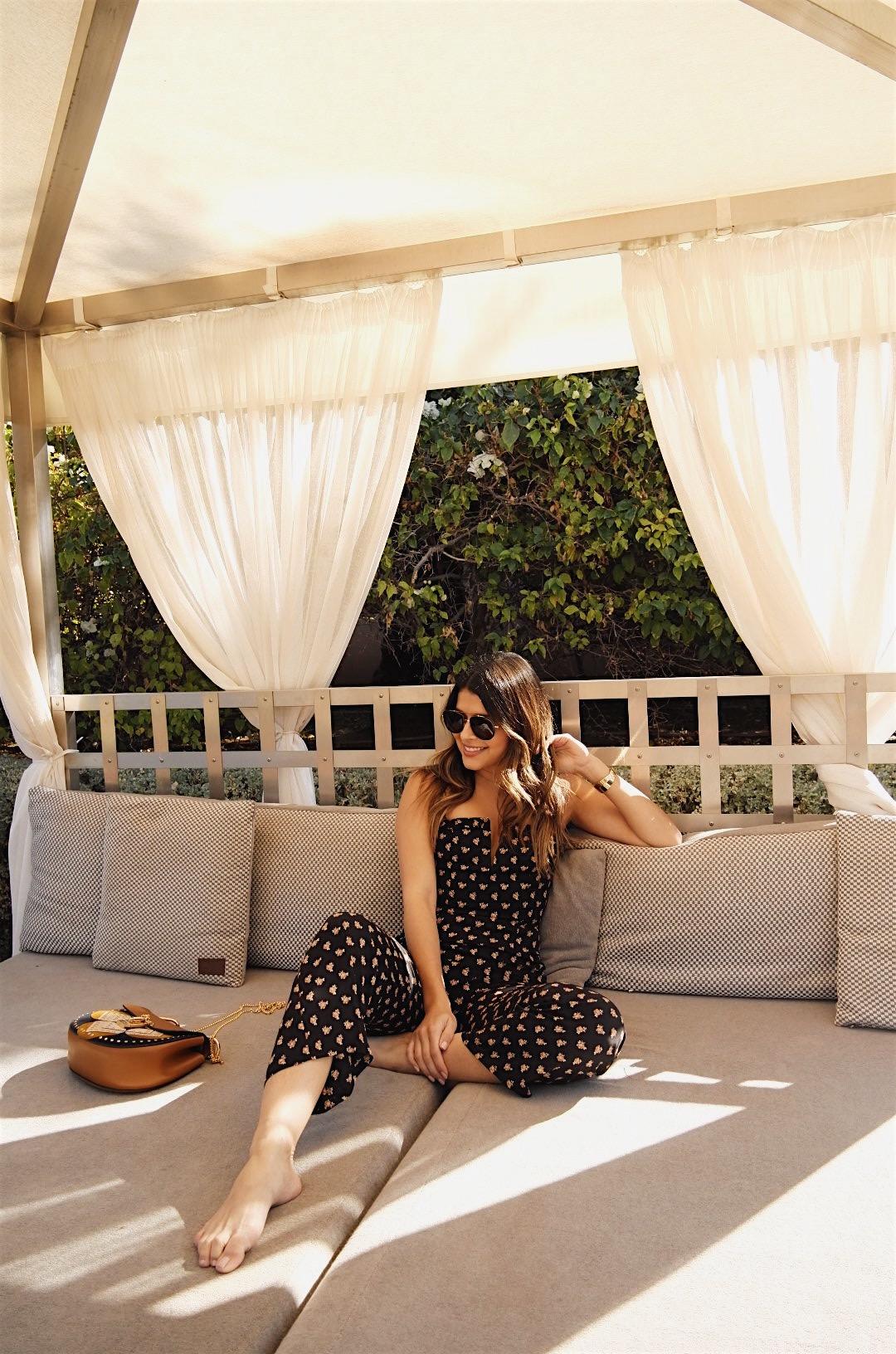 Pam Hetlinger wearing a flower jumpsuit in Marrakech, Morocco