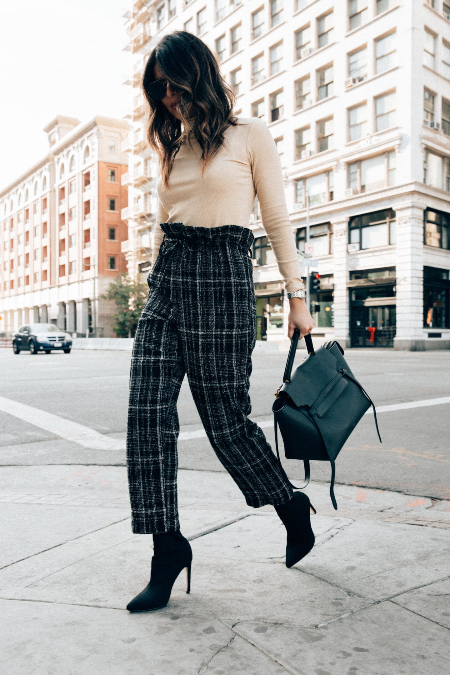 How to Set Realistic New Year's Resolutions - Green Plaid Trousers with Tan Turtleneck Sweater, Green Handbag, and Black Boots | Thegirlfrompanama.com