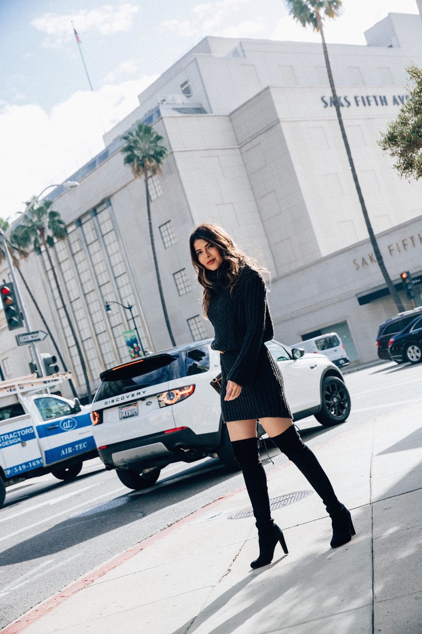 How to Look Chic in the Winter - Black Sweater Dress with Stuart Weitzman Highland Boots | Thegirlfrompanama.com