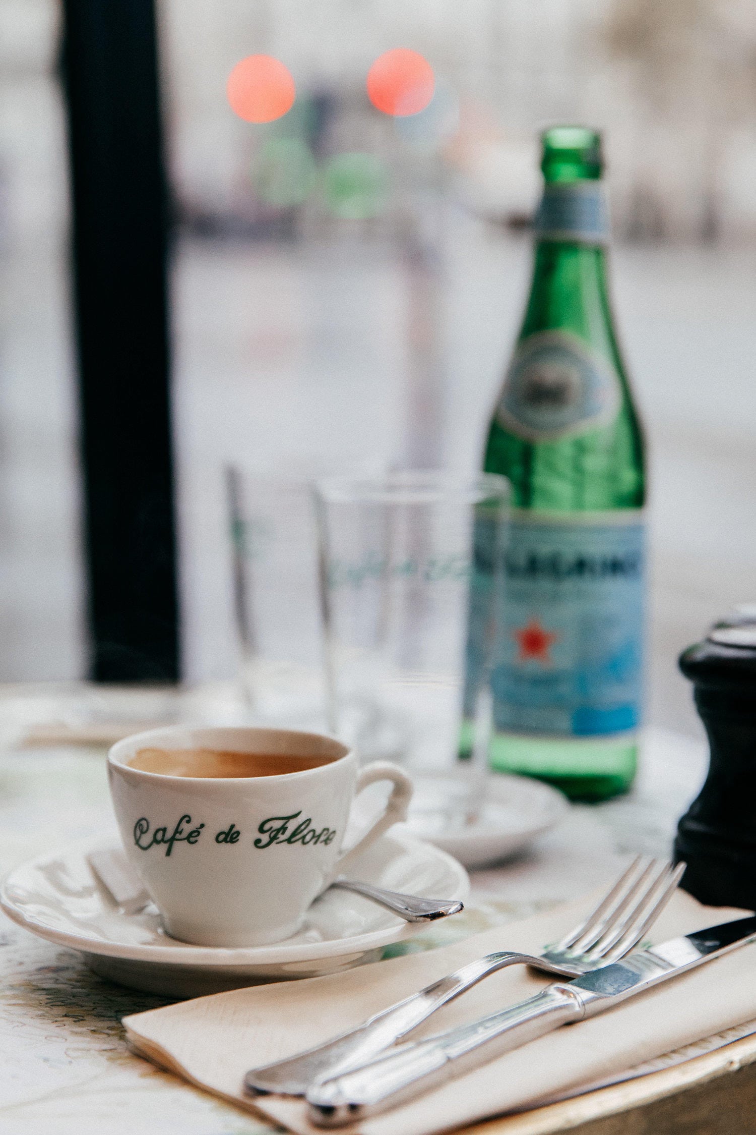 TheGirlFromPanama.com | Paris Travel Guide in the Winter | Pam Hetlinger at Cafe de Flore in Paris, France