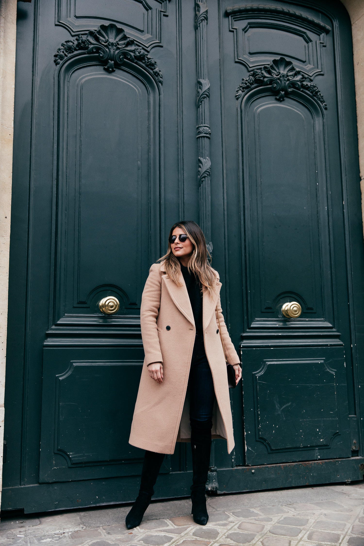 TheGirlFromPanama.com | Paris Travel Guide in the Winter | Pam Hetlinger wearing a camel coat in Paris France