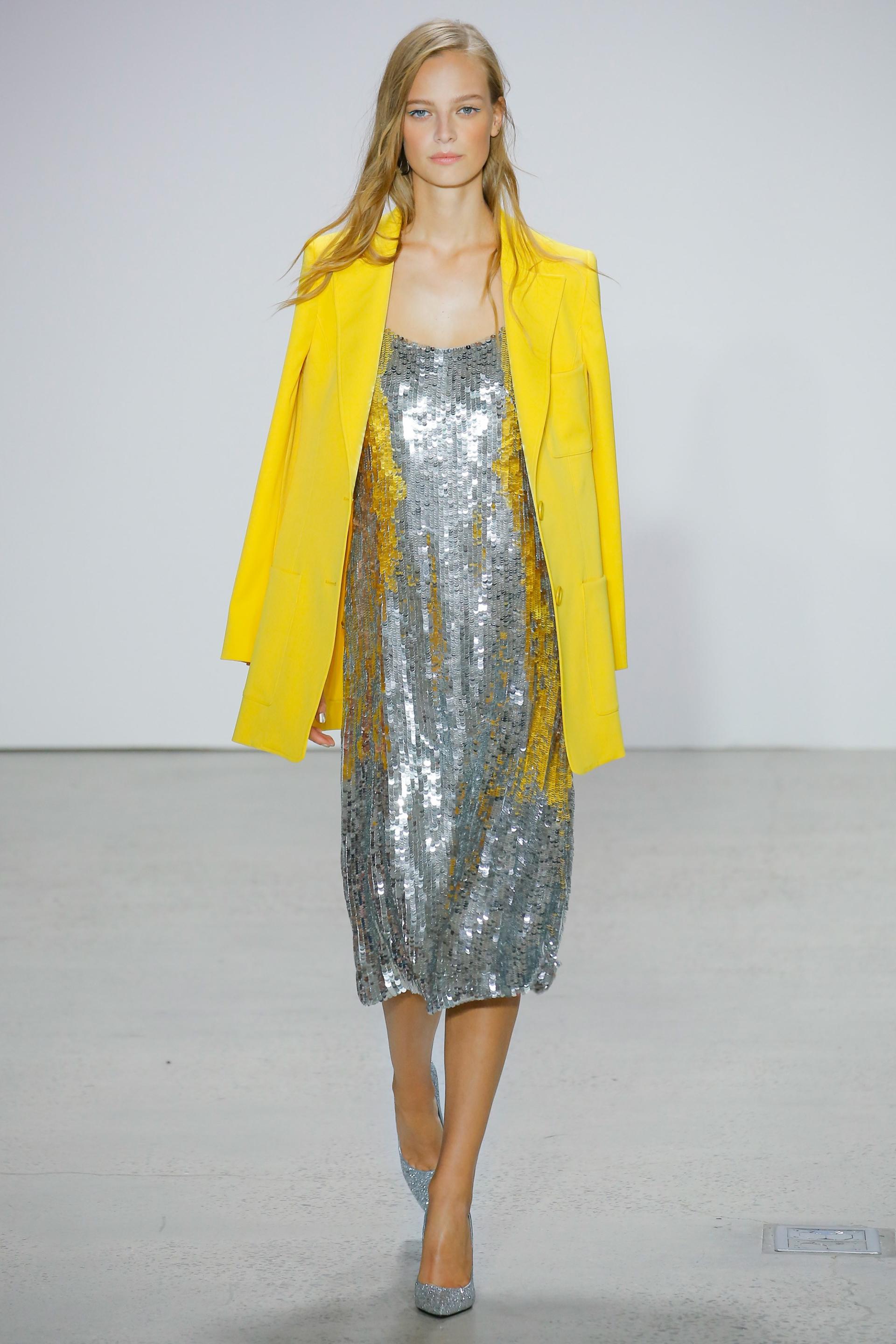 Metallic dress with a yellow jacket