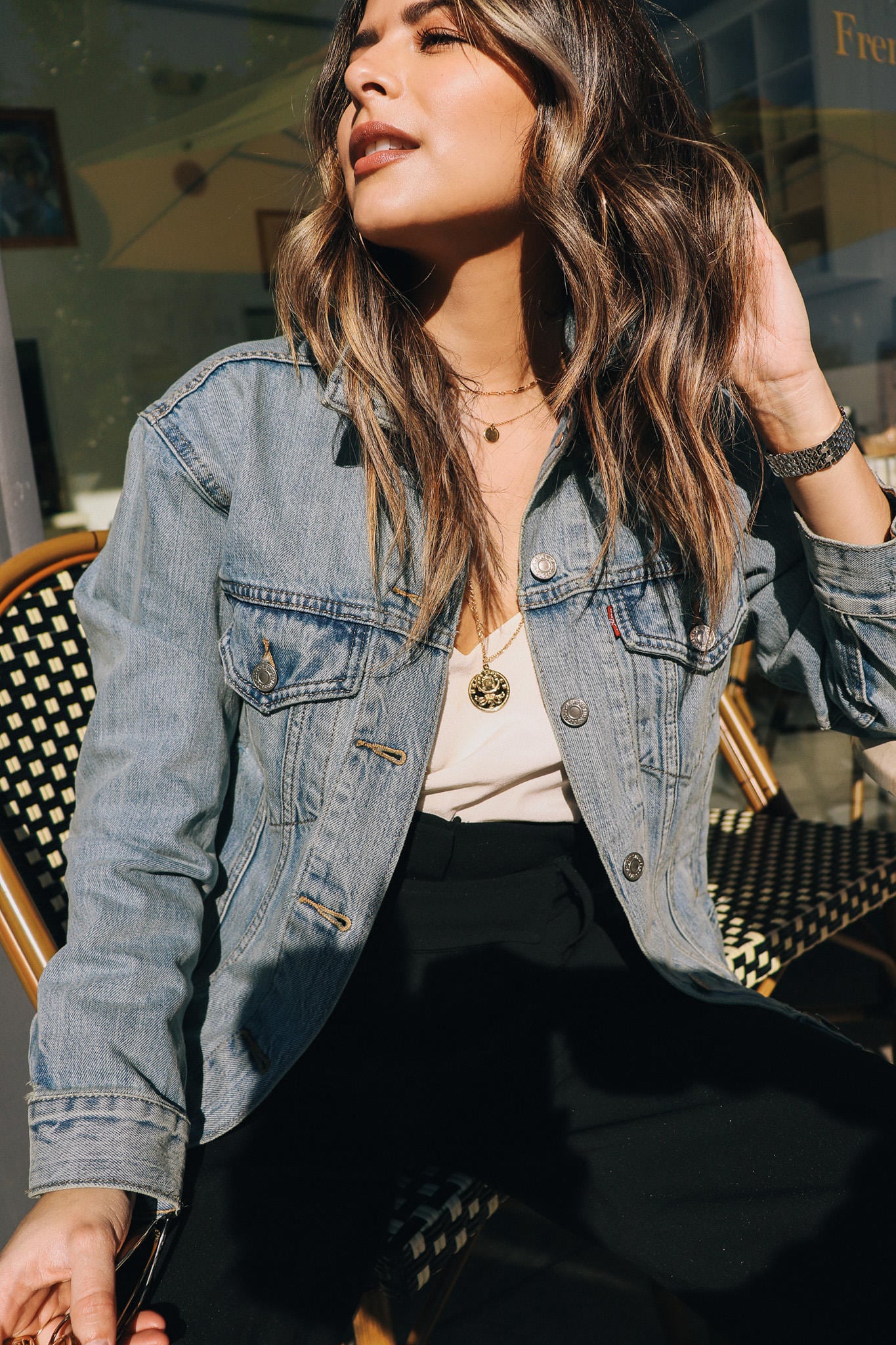 Denim Jacket with layered necklaces