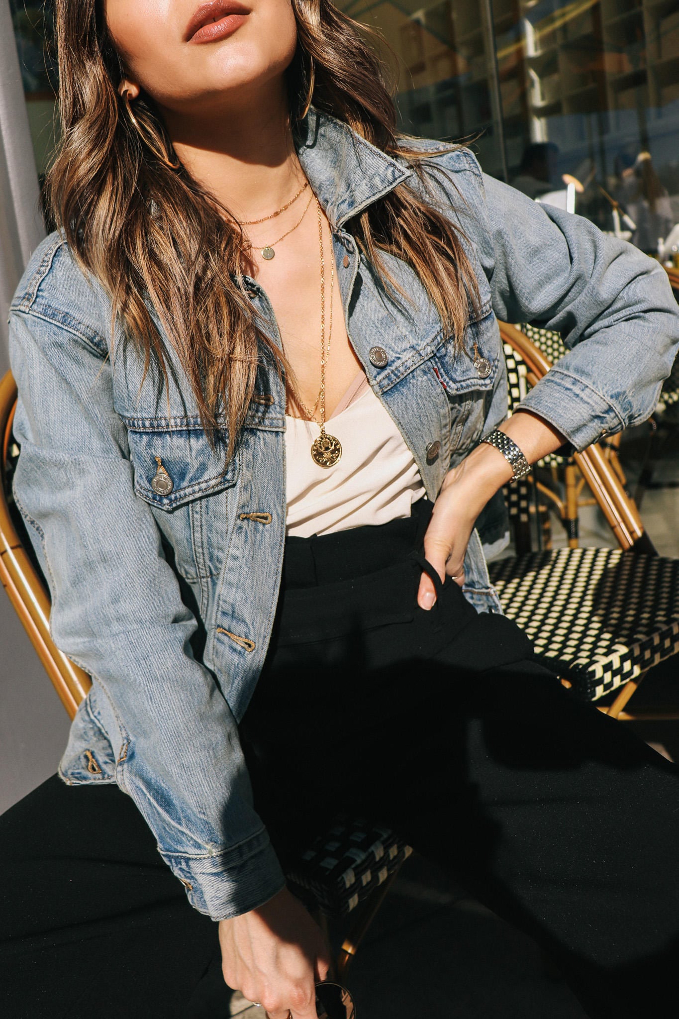 Denim Jacket with layered necklaces