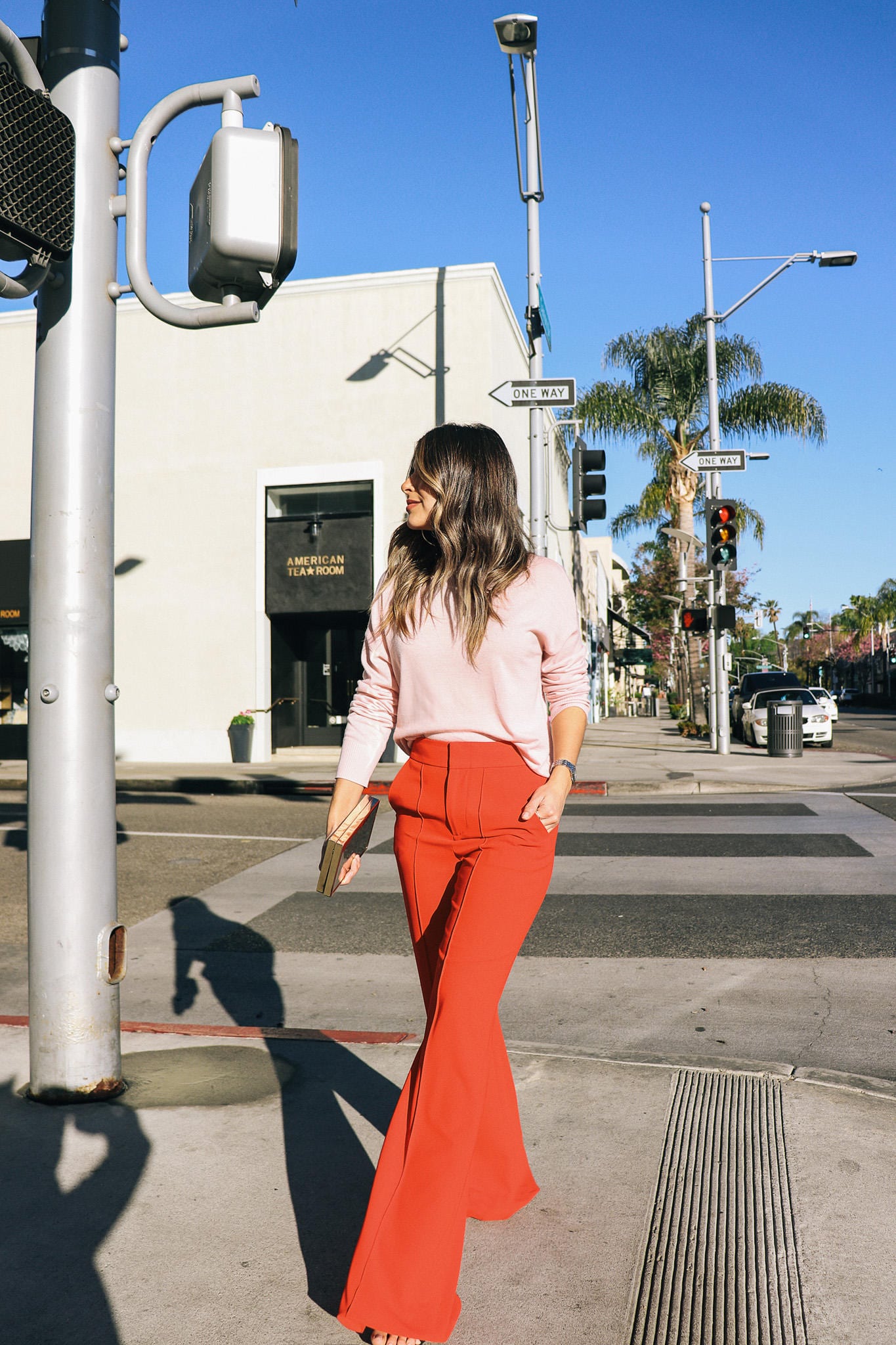 Pink sweater and red pants