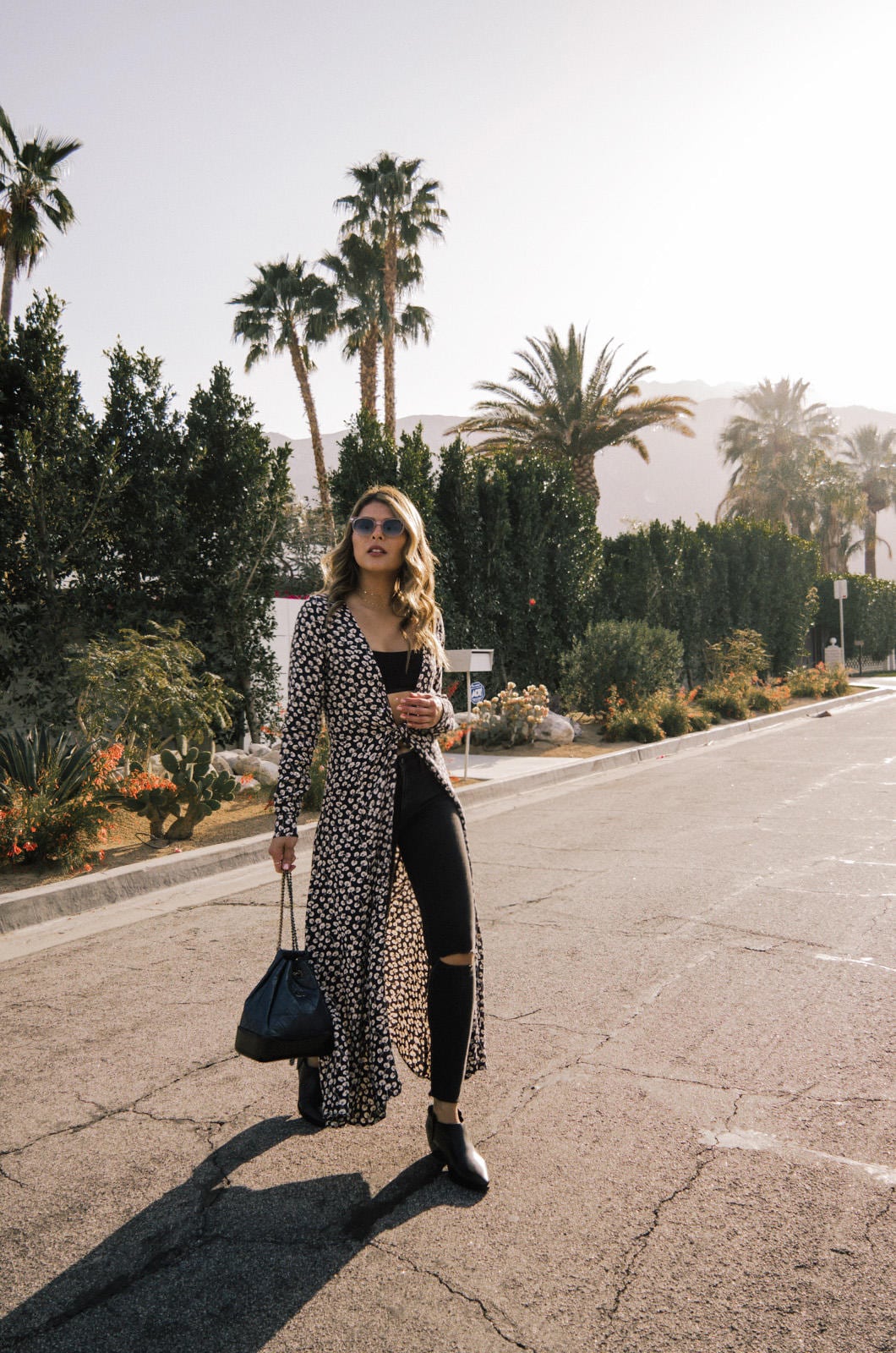 Pam Hetlinger in a Floral Kimono, Black Denim, and Chain Bag, Coachella Outfits | TheGirlFromPanama.com