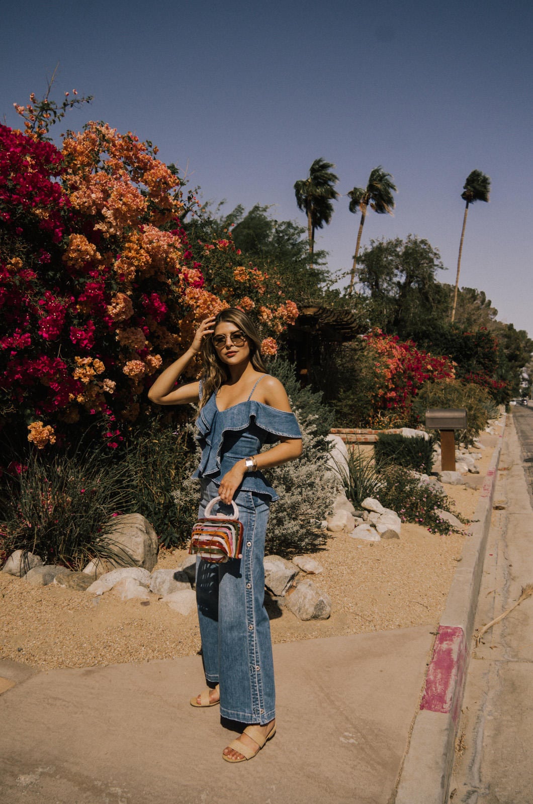 Pam Hetlinger wearing Dark Denim Jumpsuit at Coachella - Fesitval Outfits Round Up | TheGirlFromPanama.com