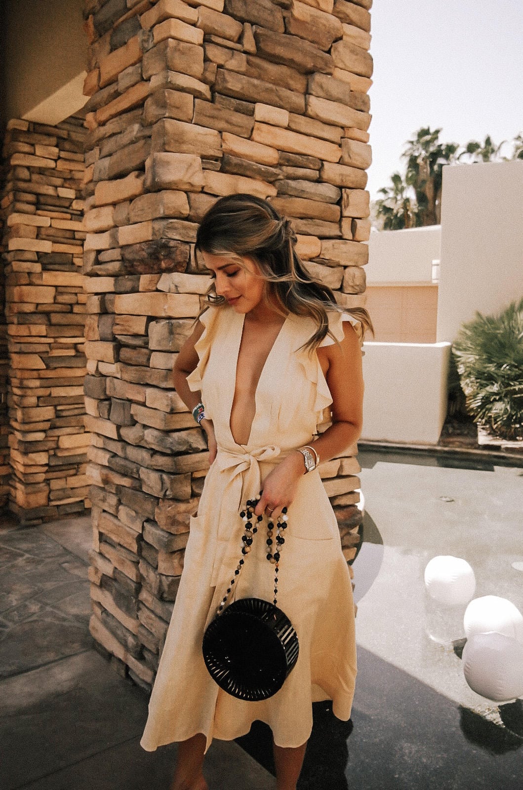 Pam Hetlinger in a Beige Reformation Dress and Circle Chain Bag, Coachella Outfits | TheGirlFromPanama.com
