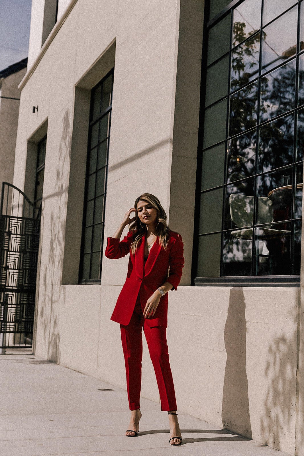 Pam Hetlinger Outfits, Red Power Suit, Trouser Suit Trend, Street Style | TheGirlFromPanama.com