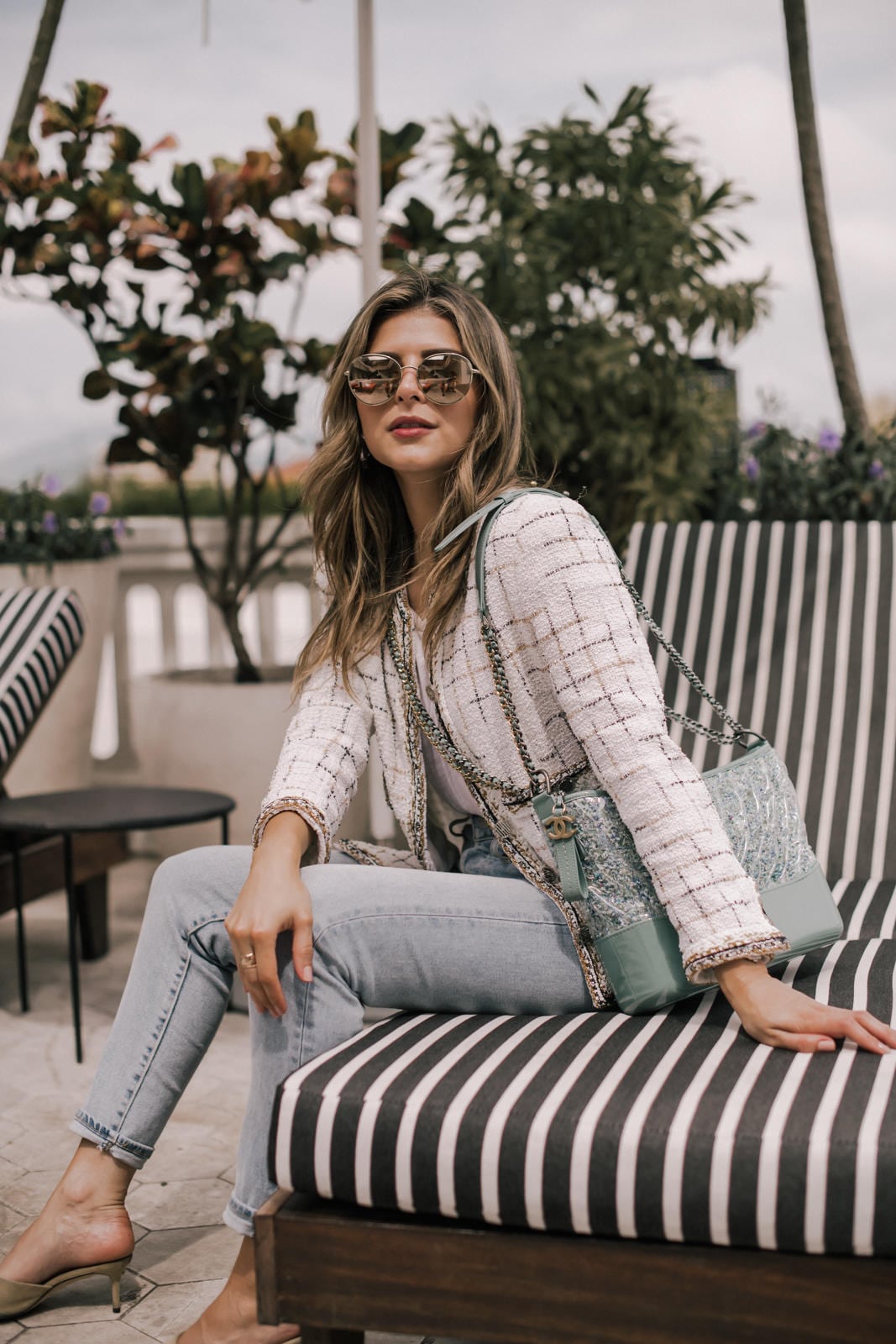 Pam Hetlinger style, tweed jacket, chanel bag, light washed denim, denim outfit, mirrored sunglasses | TheGirlFromPanama.com