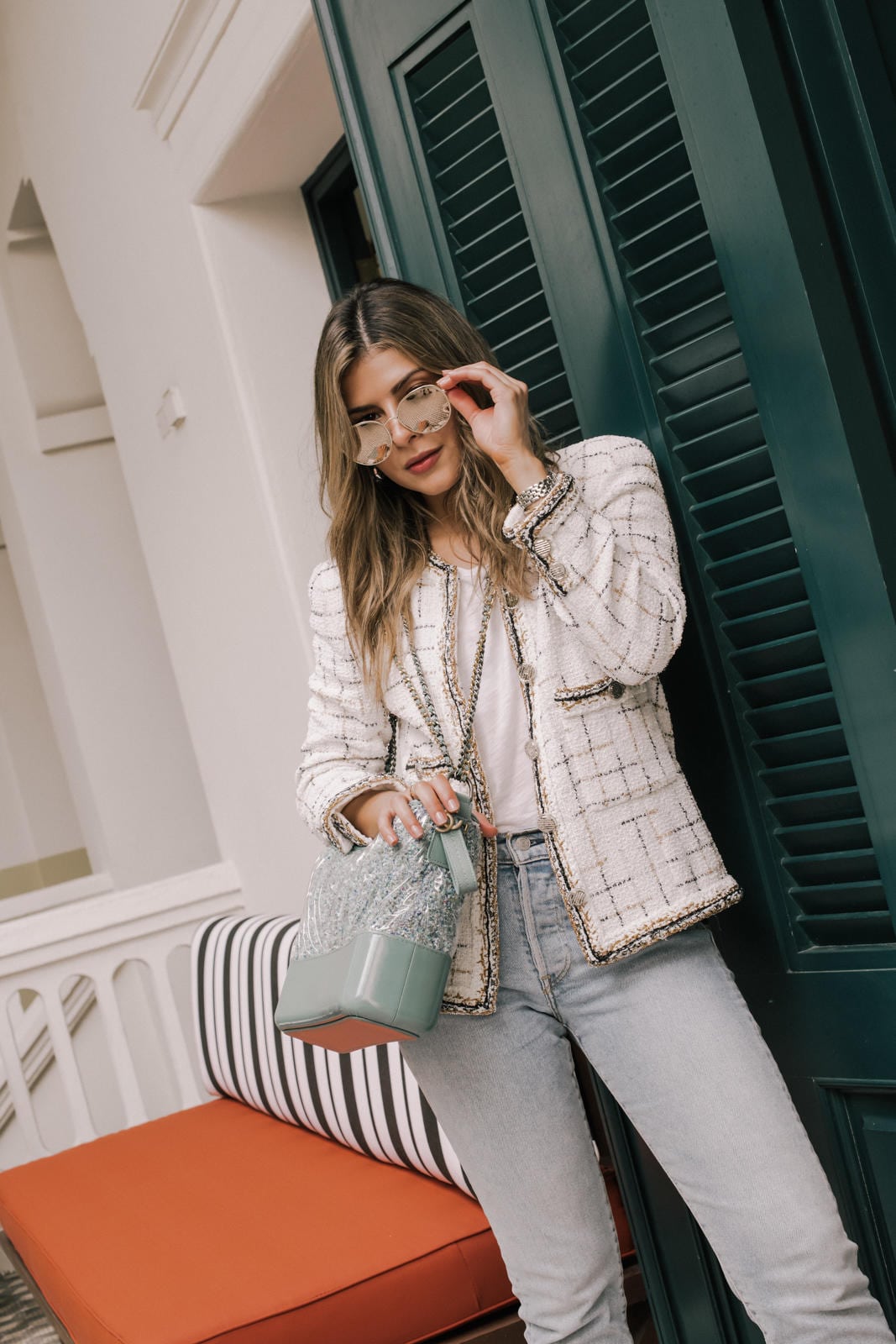 Pam Hetlinger style, tweed jacket, chanel bag, light washed denim, denim outfit, mirrored sunglasses | TheGirlFromPanama.com