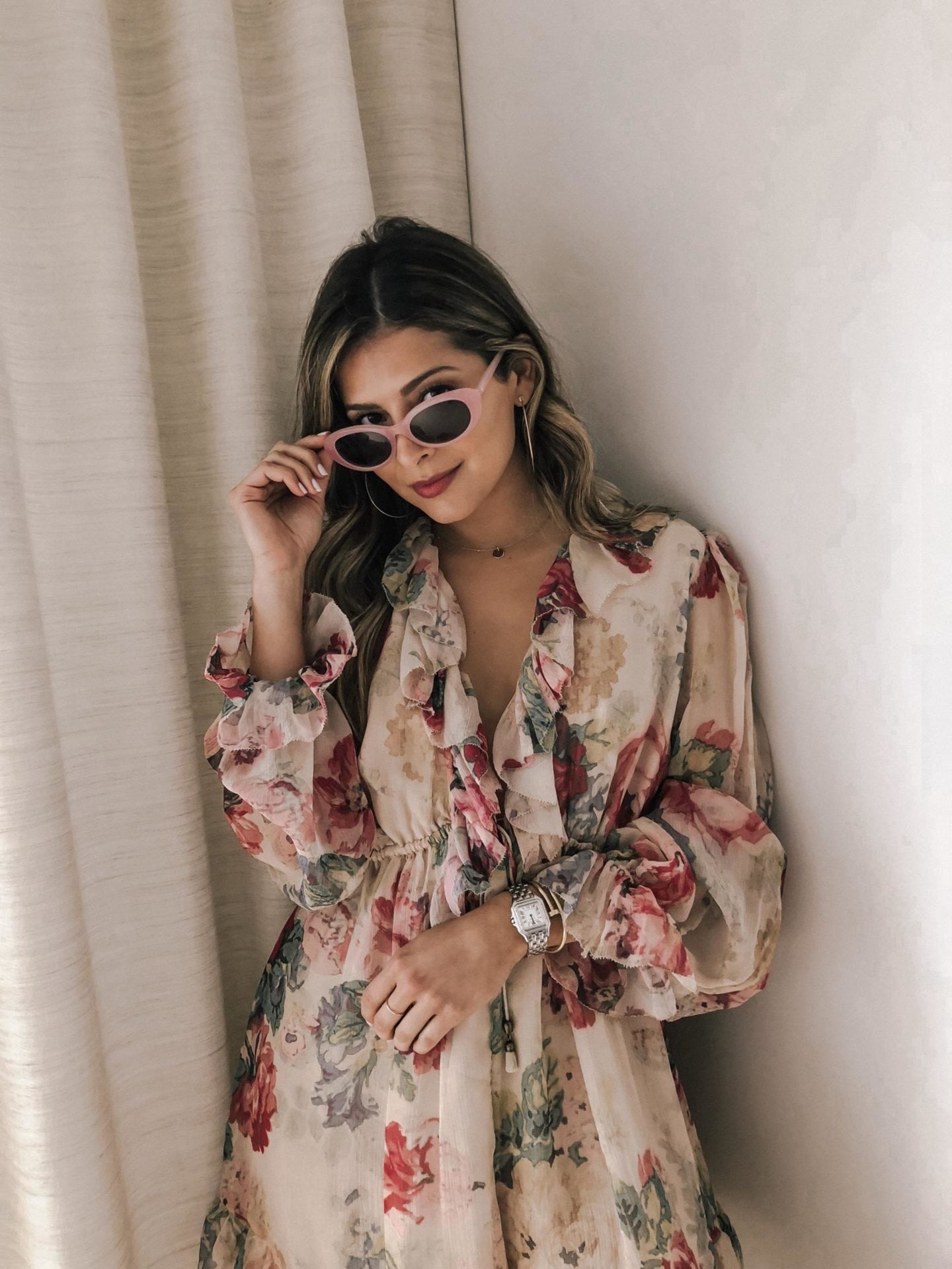 What to Wear to The Hamptons by Pam Hetlinger | Summer Fridays Hamptons Trip, Top LA Bloggers, Pam Hetlinger Style, Ruffle jumpsuit, oval sunglasses, Floral Ruffle Romper, Zimmerman Outfit, Chic Beach Look | TheGirlFromPanama.com