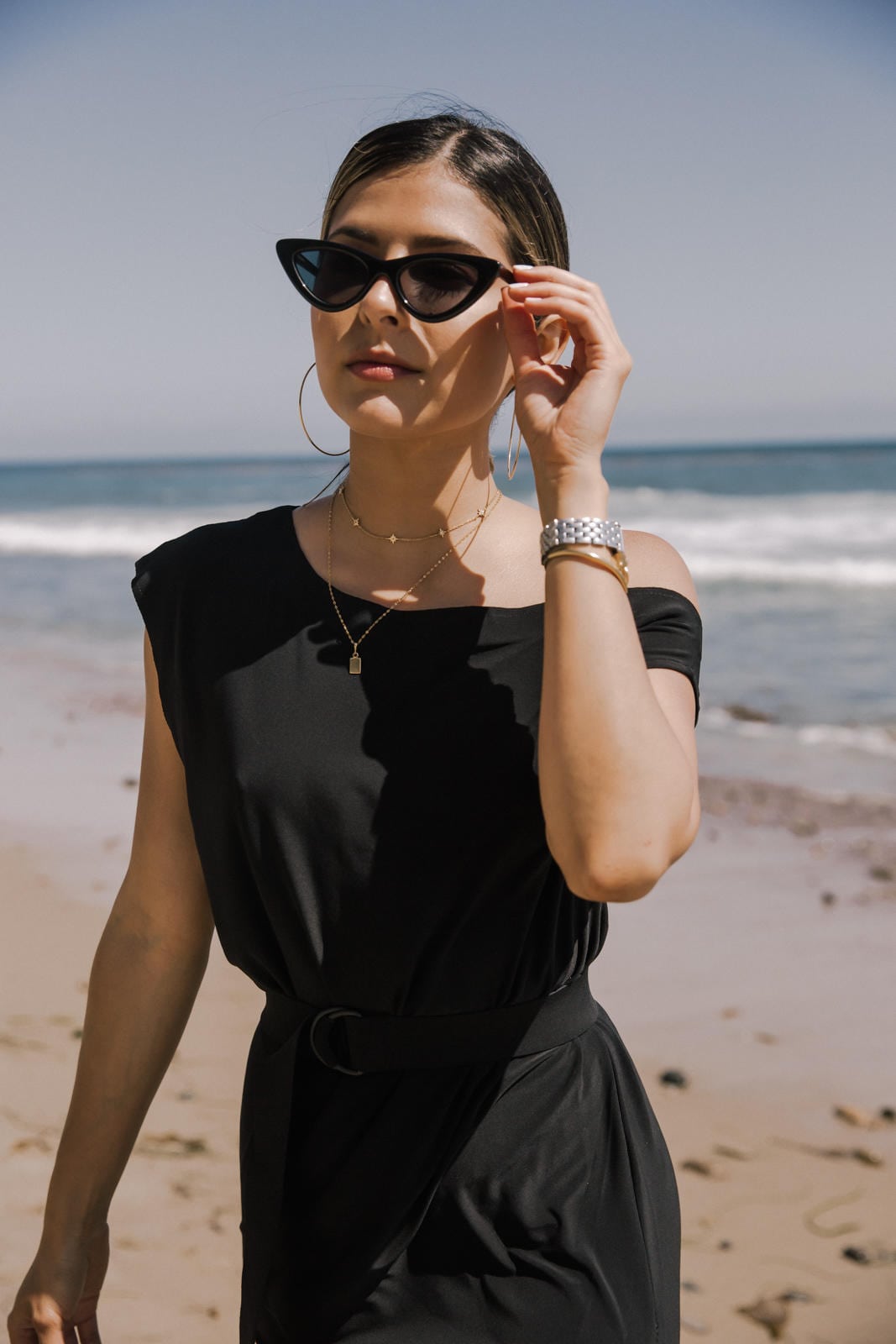 Sunglasses I Can't Stop Wearing This Summer by Pam Hetlinger | Le Specs Cat Eyes Sunglasses, Black slit dress, toe ring sandals