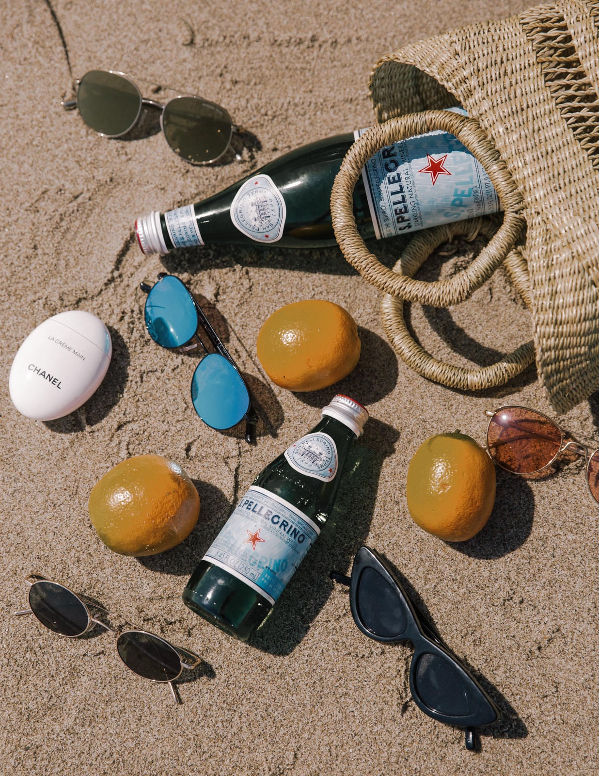 Sunglasses I Can't Stop Wearing This Summer by Pam Hetlinger | Beach Flatlay, sunglasses trends
