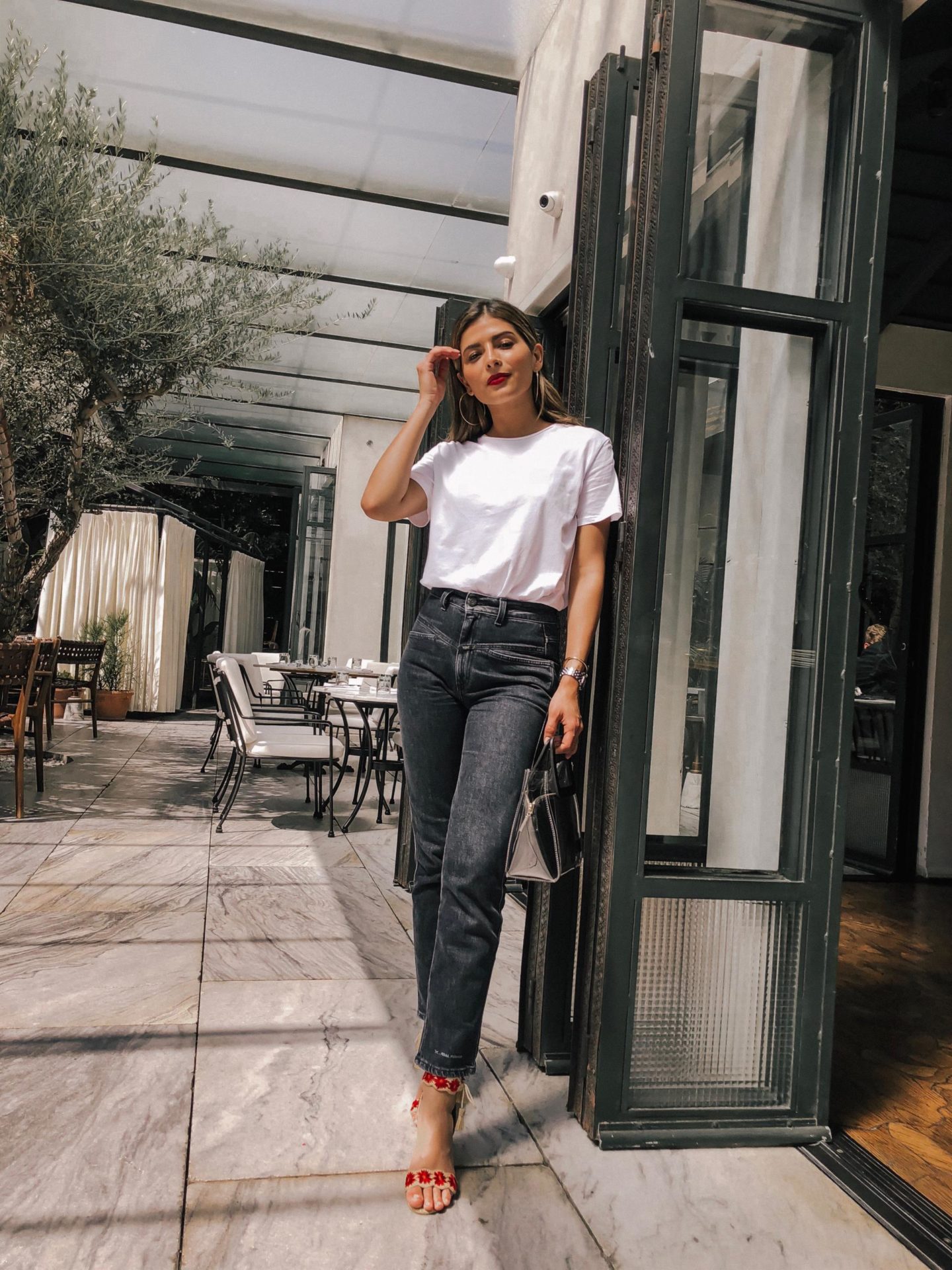 3 Tips for Styling a Basic White Tee by Pam Hetlinger | TheGirlFromPanama.com | White Tee, Staud Bag, Mom Jeans, Tabitha Simmons Heels