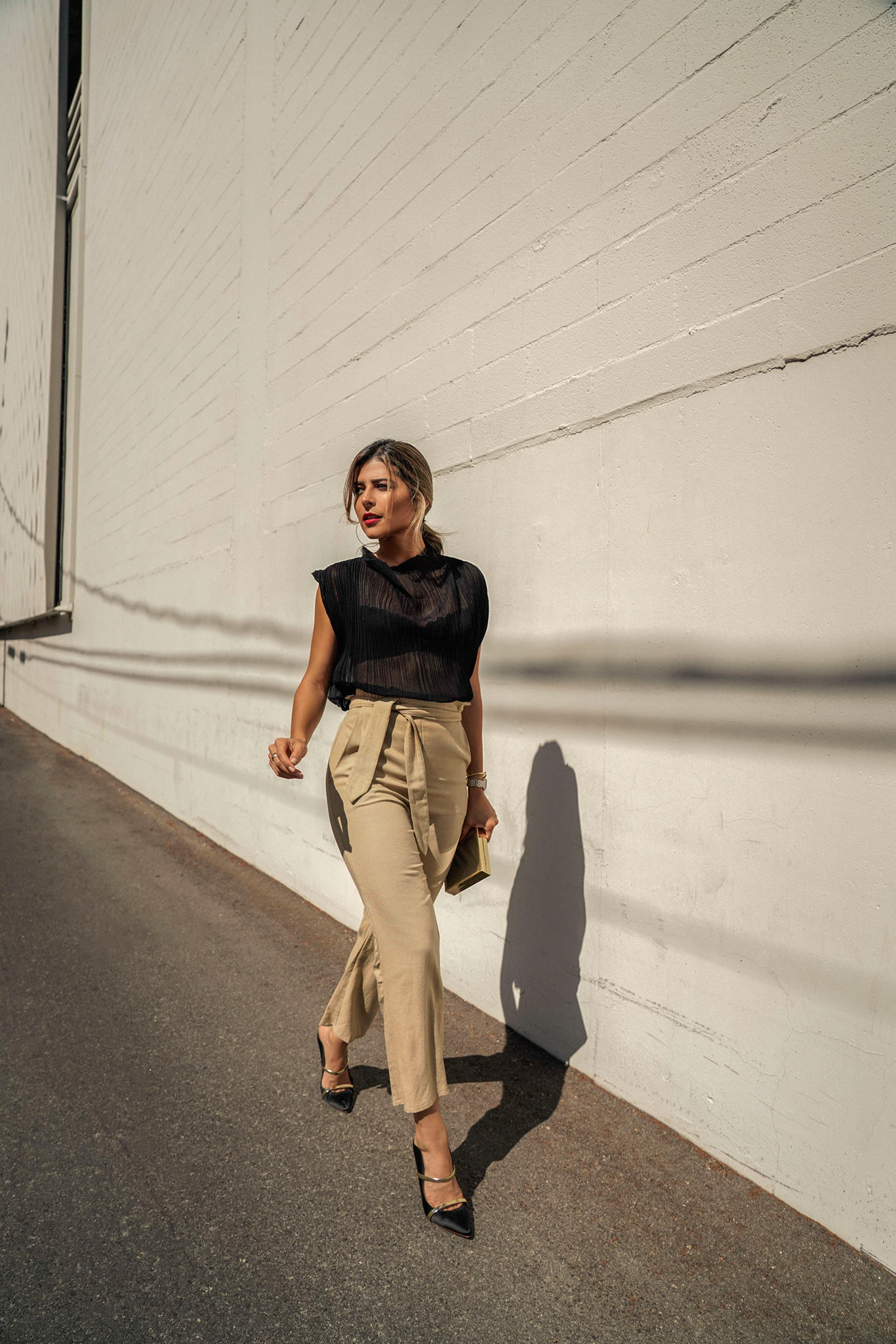 Chic Outfits That Never Go Out of Style by Pam Hetlinger | TheGirlFromPanama.com | Black Sheer Top, Sheer top outfit, tie waist trousers, chic weekend style, classy style