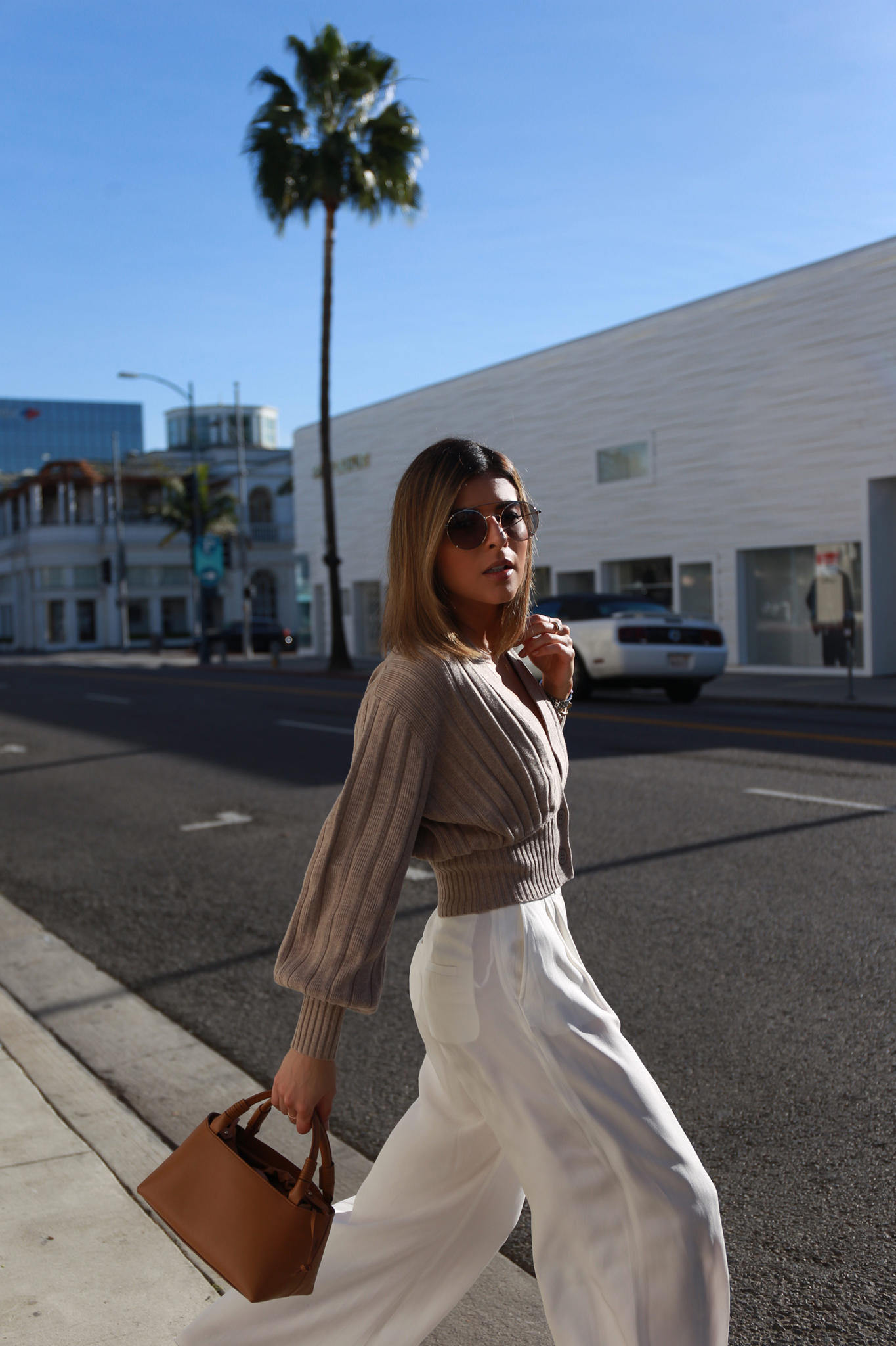 The Fall Outfit to Wear for Work and Play by Pam Hetlinger | TheGirlFromPanama.com | Chic fall look, fall outfit ideas for work, classy fall outfit, wide leg pants, ribbed cardigan, oversized cardigan, carolina santo domingo bag, cartier watch