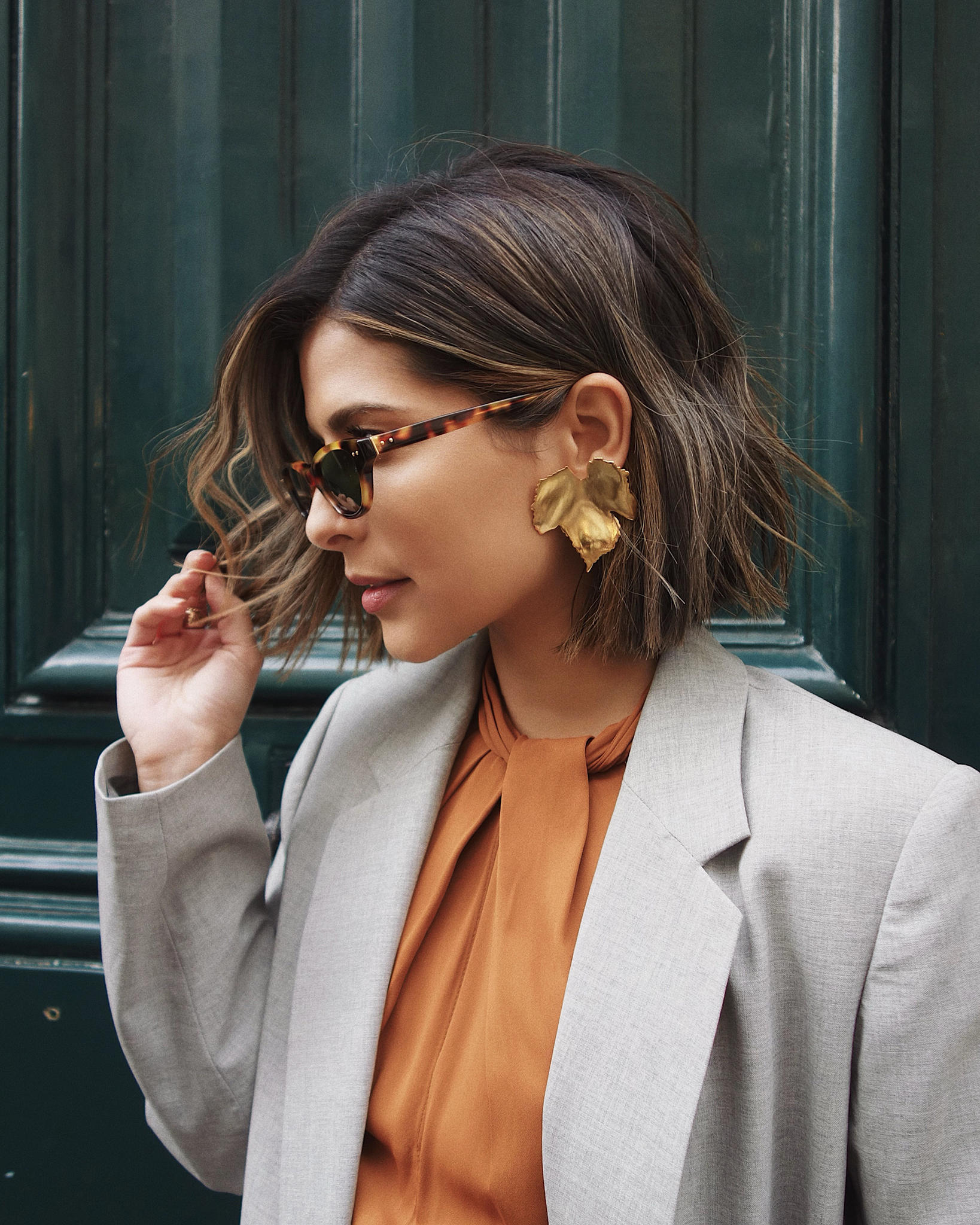 Paris Fashion Week FW19 Recap by Pam Hetlinger | TheGirlFromPanama.com | paris fashion week street style, fashion week spring 2019 street style, gold statement earrings, wavy lob hairstyle